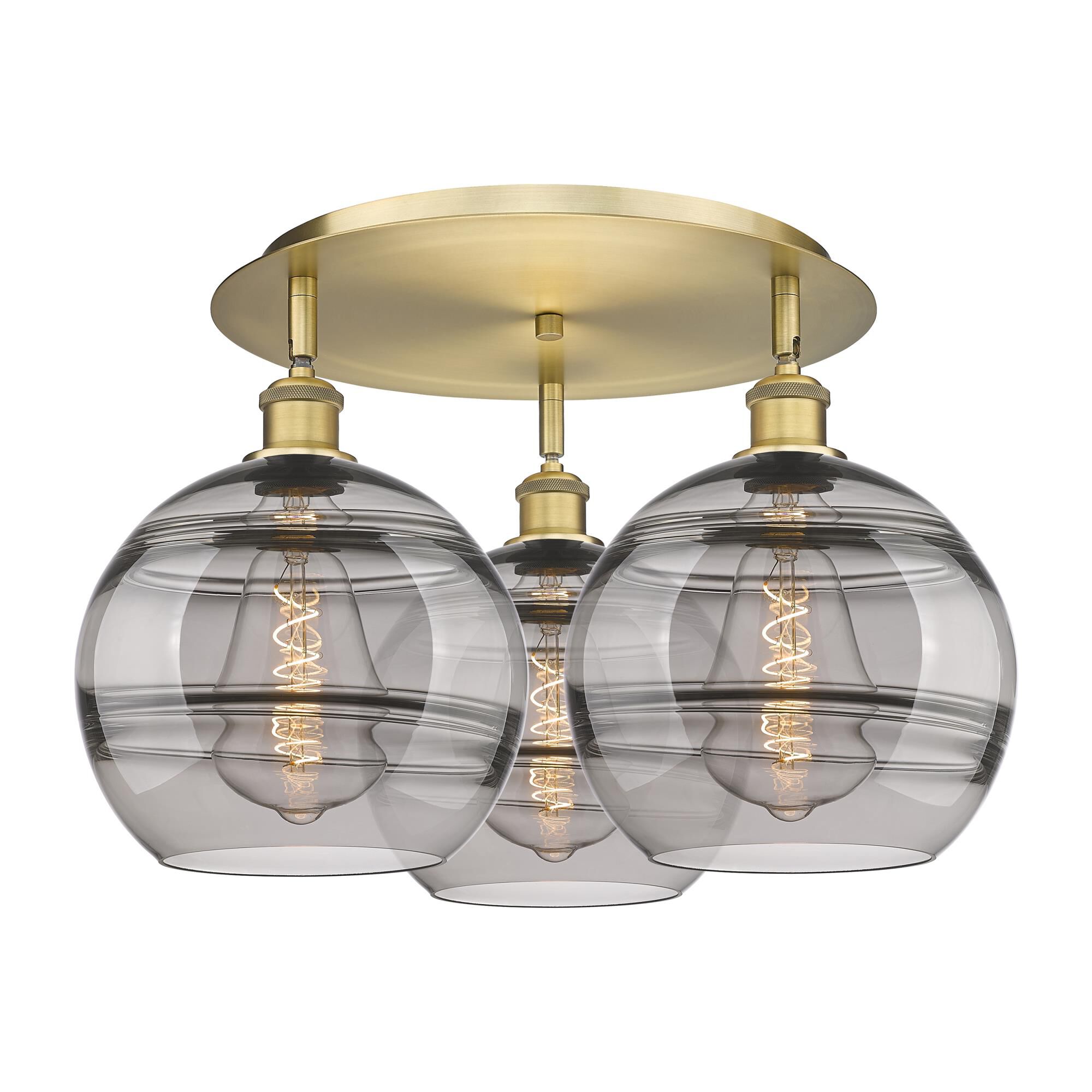 Shown in Brushed Brass finish and Light Smoke glass