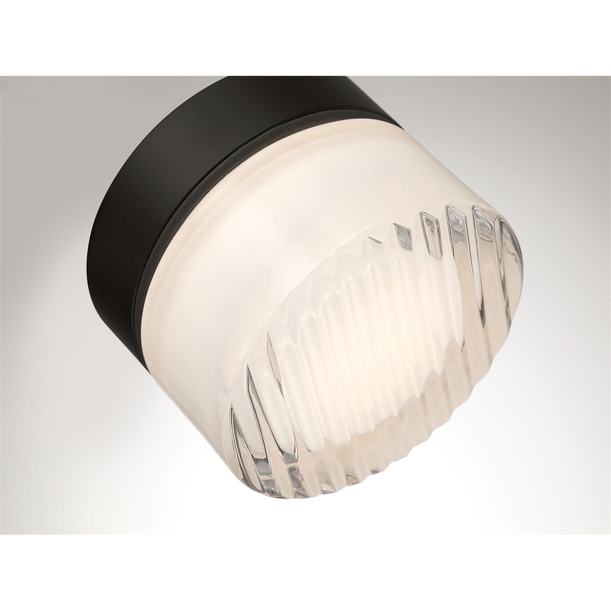 Shown in Matte Black finish and Clear Ribbed glass