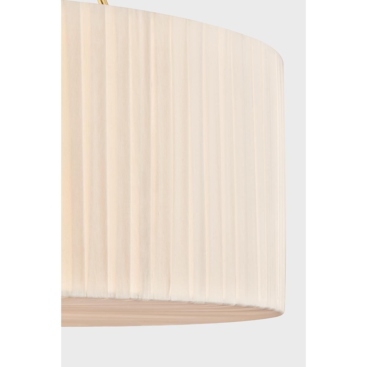 Shown in Aged Brass finish and Ivory Linen shade