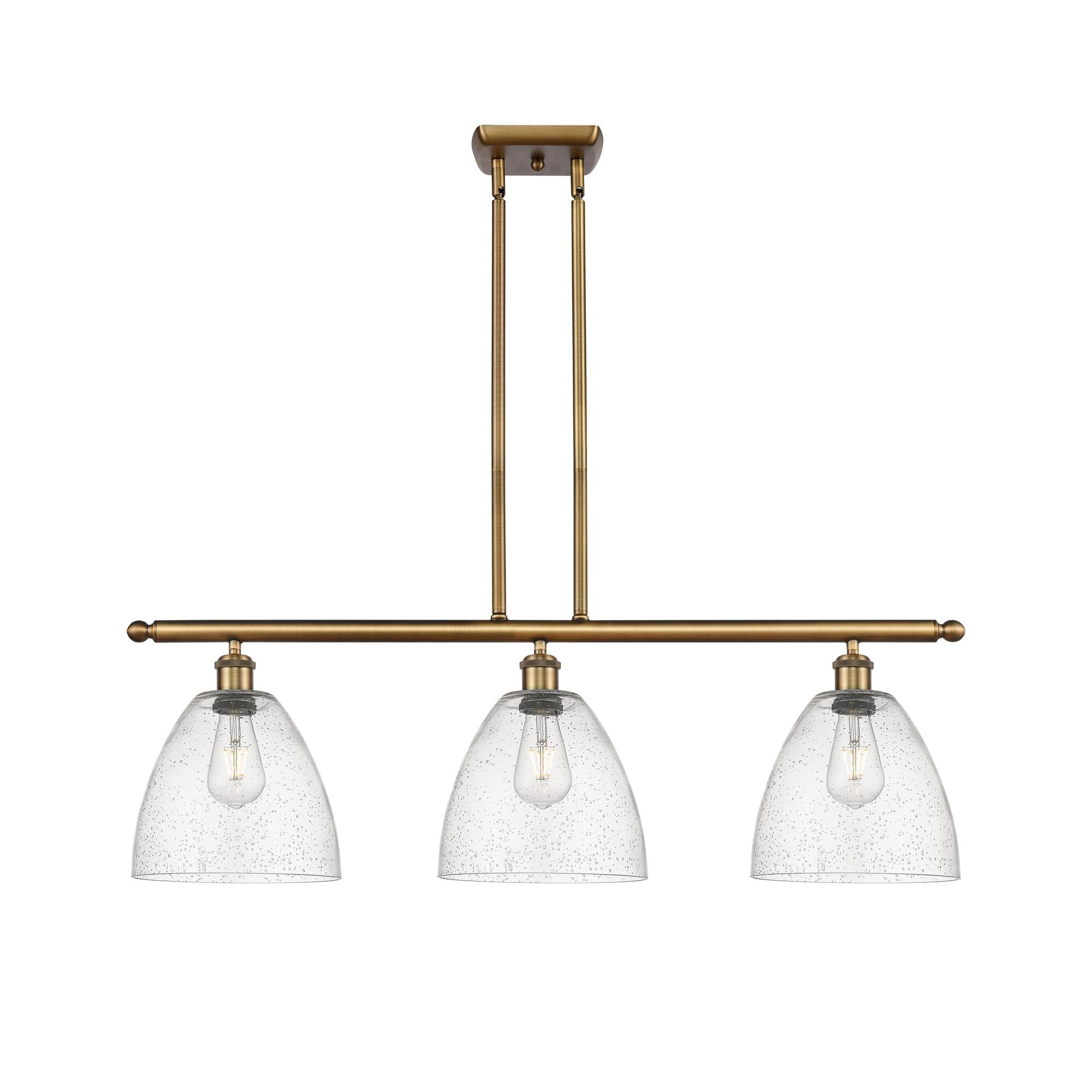 Shown in Brushed Brass finish and Seedy Ballston Dome glass