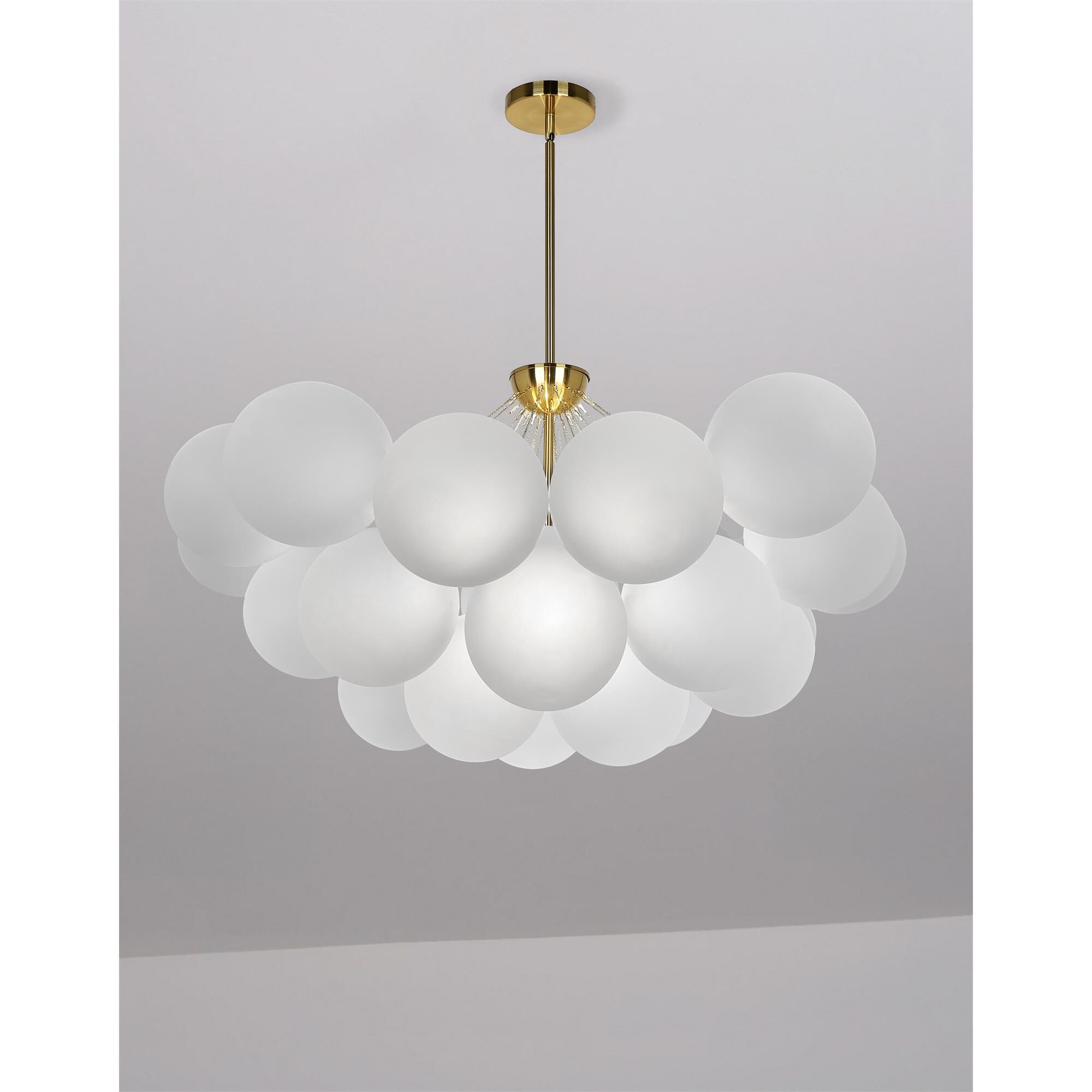 Shown in White and Aged Brass finish and White Globe glass