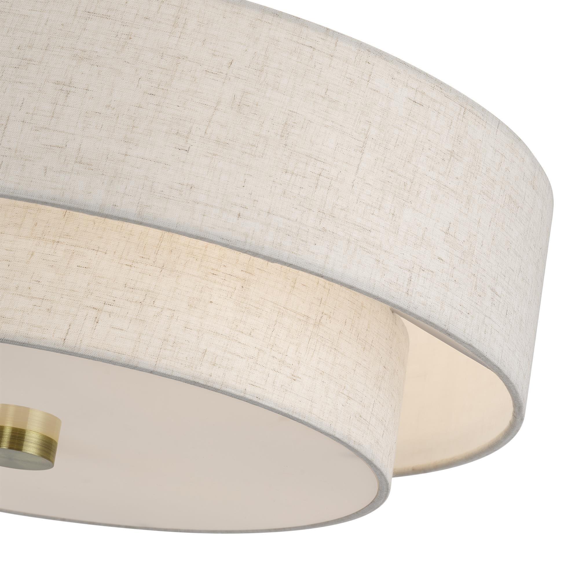 Shown in Antique Brass finish and Hand Crafted Oatmeal Color Fabric with White Color Inside shade