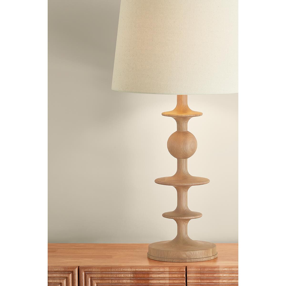 Shown in Aged Brass finish and Wheat Linen shade