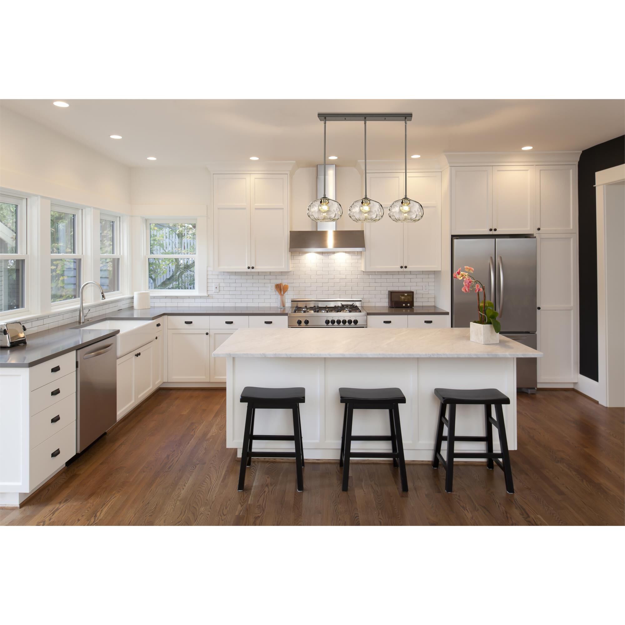 Shown in Brushed Nickel finish and Glass shade