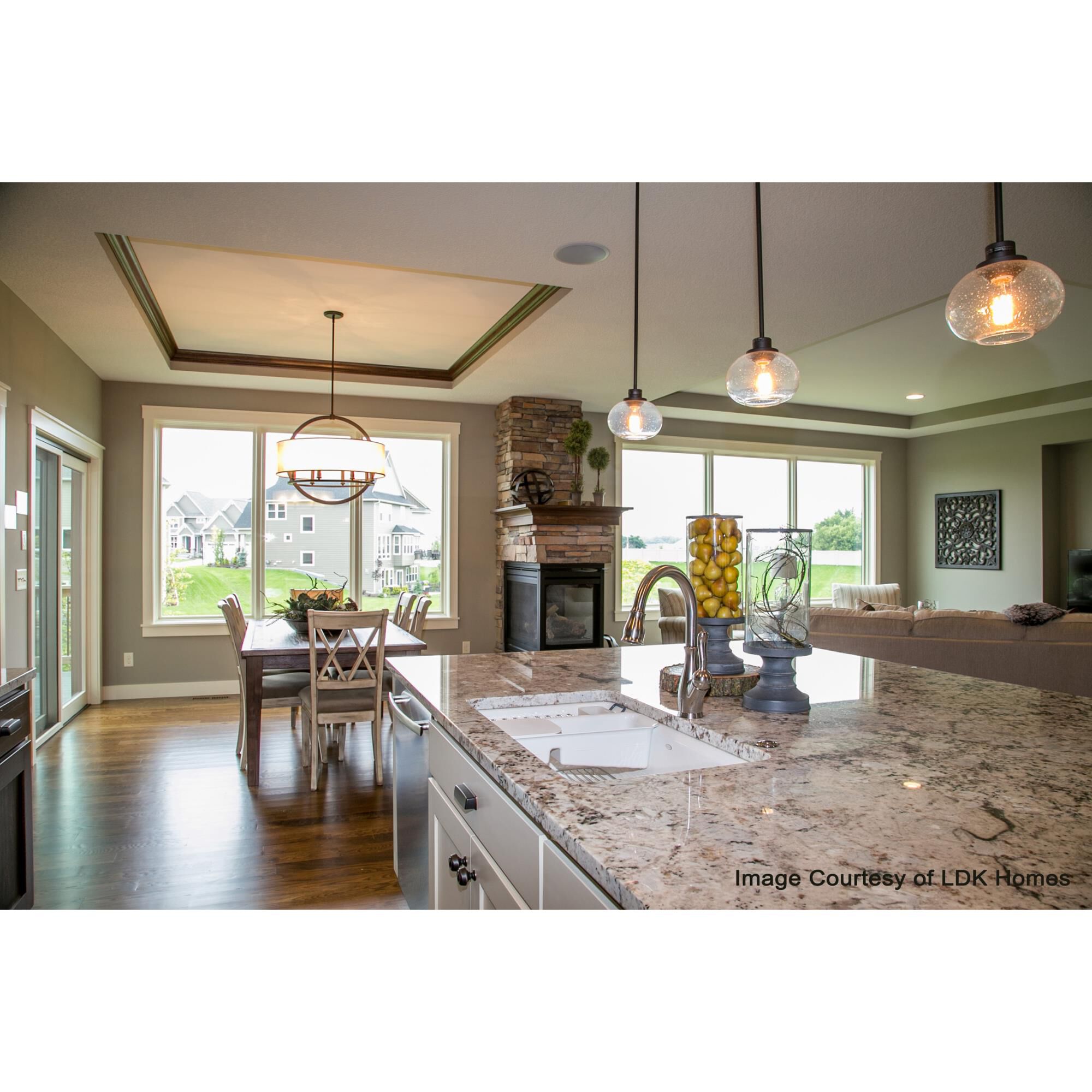 Shown in Old Bronze finish and Clear Seedy glass