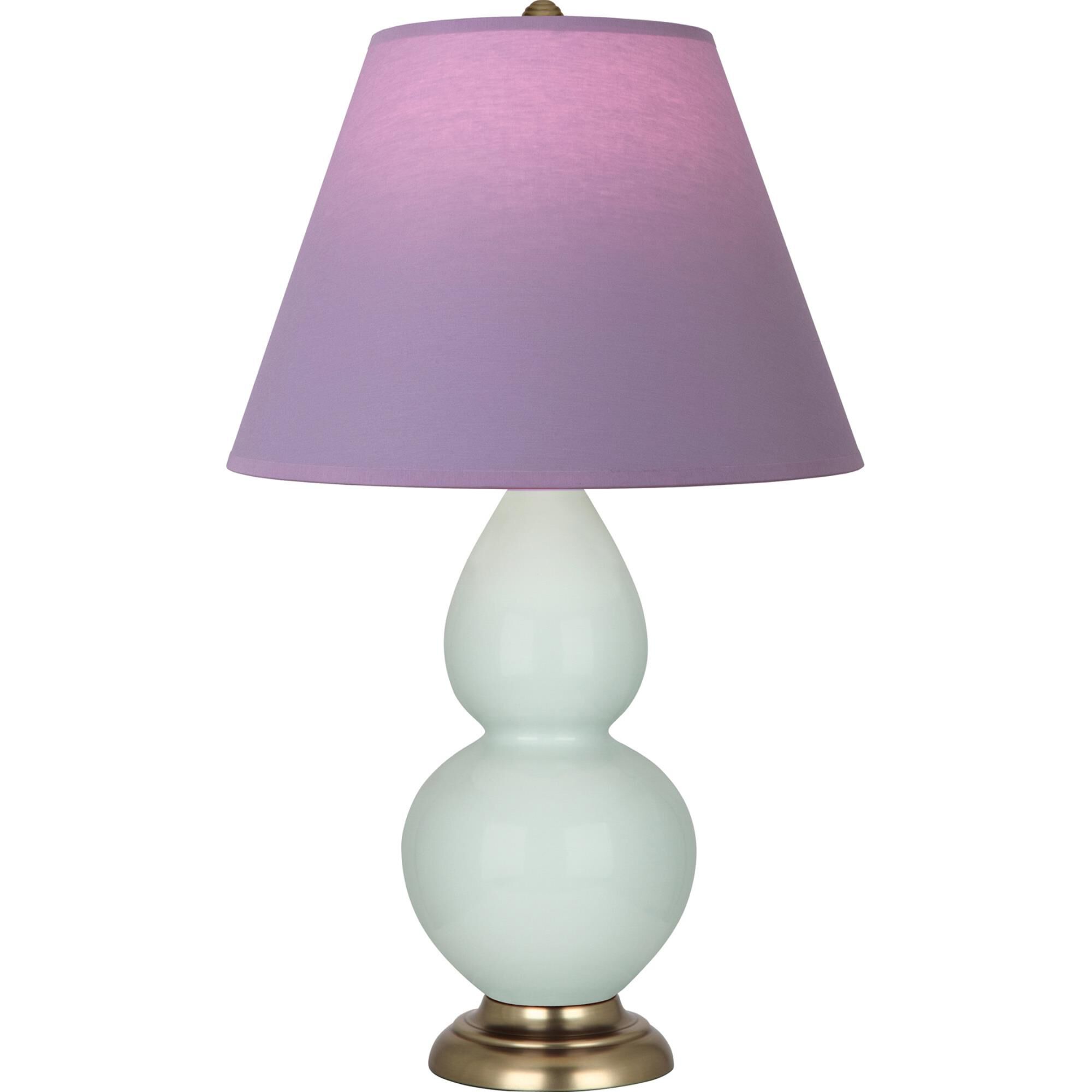 Shown in Celadon finish and Lavender and Plum shade and Antique Natural Brass accent