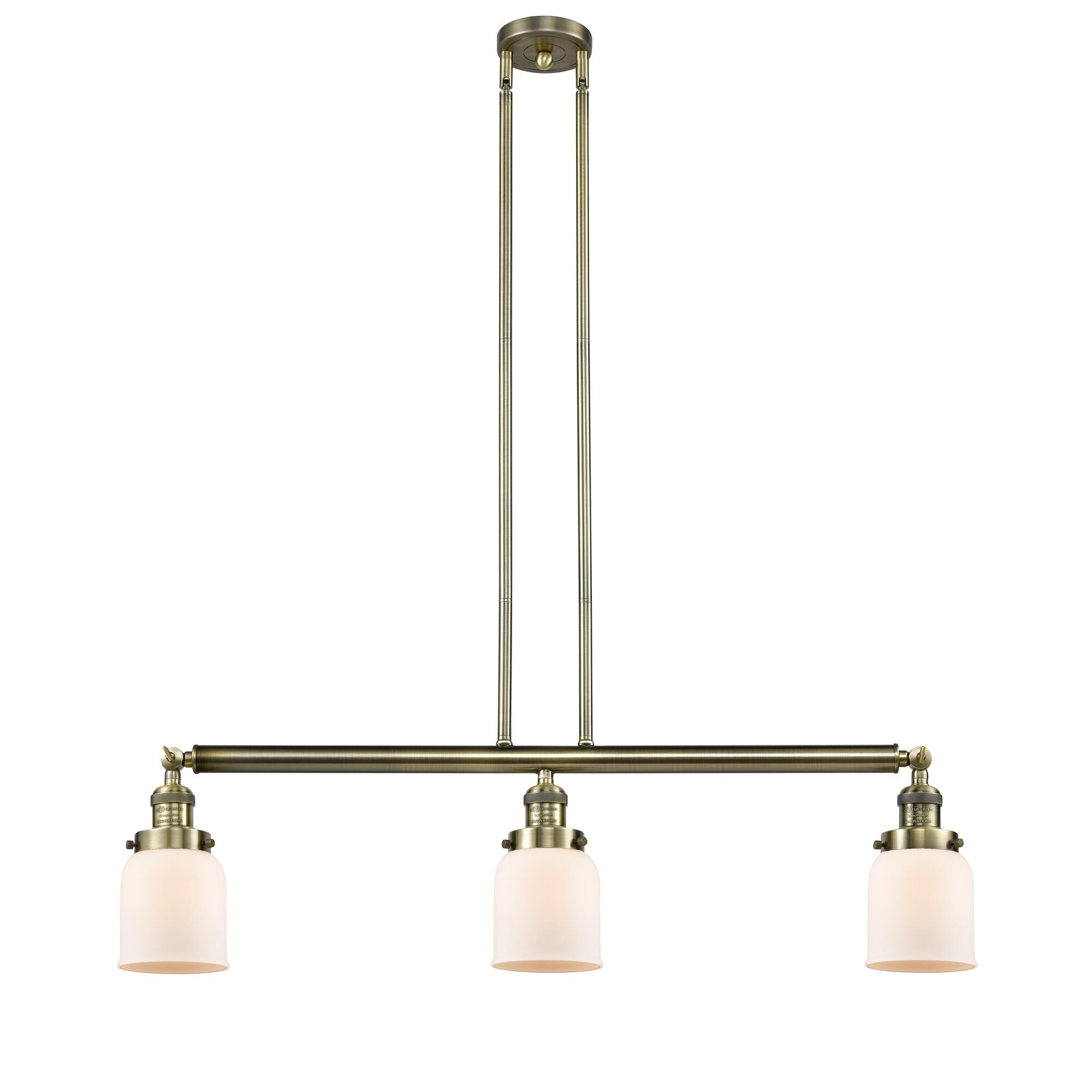 Shown in Antique Brass finish and Matte White Cased glass