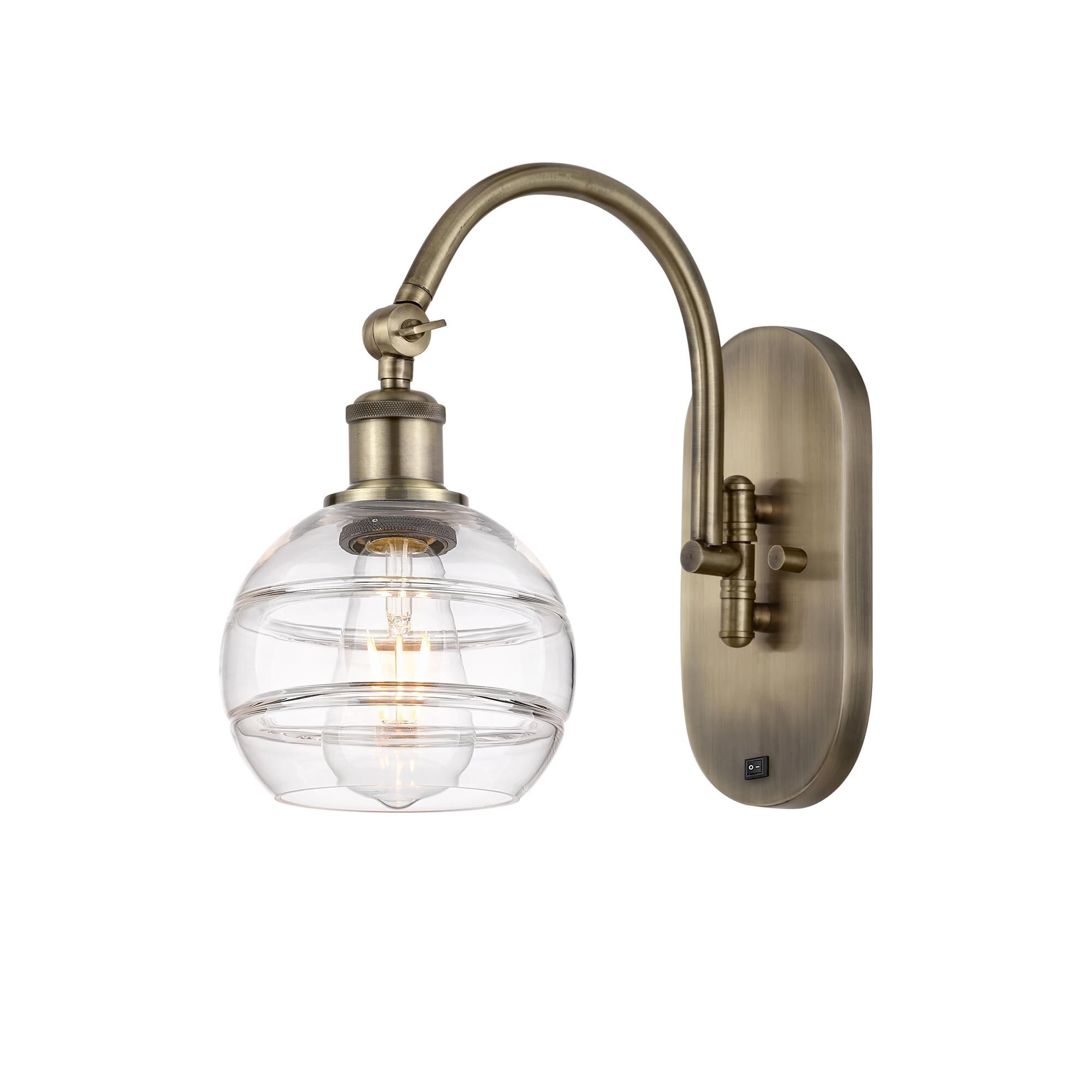 Shown in Antique Brass finish and Clear glass