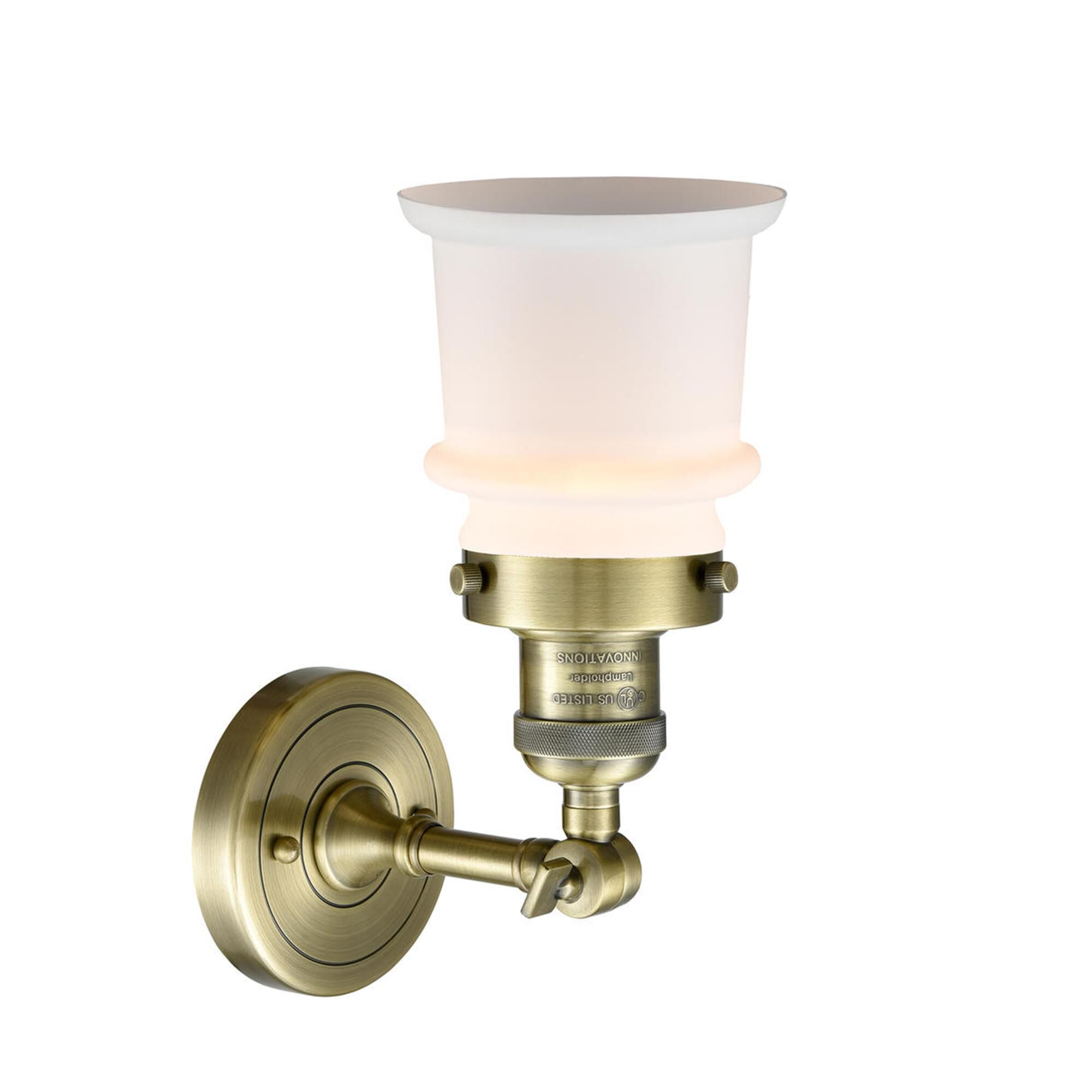 Shown in Antique Brass finish and Matte White Cased glass