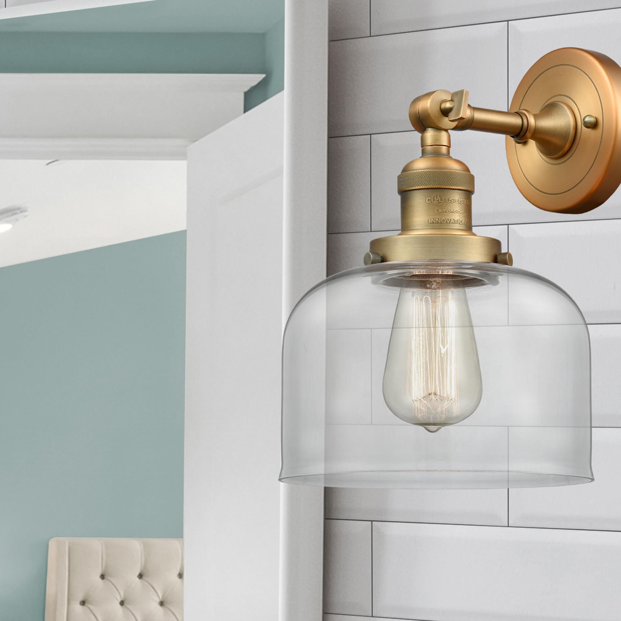 Shown in Brushed Brass finish and Clear glass