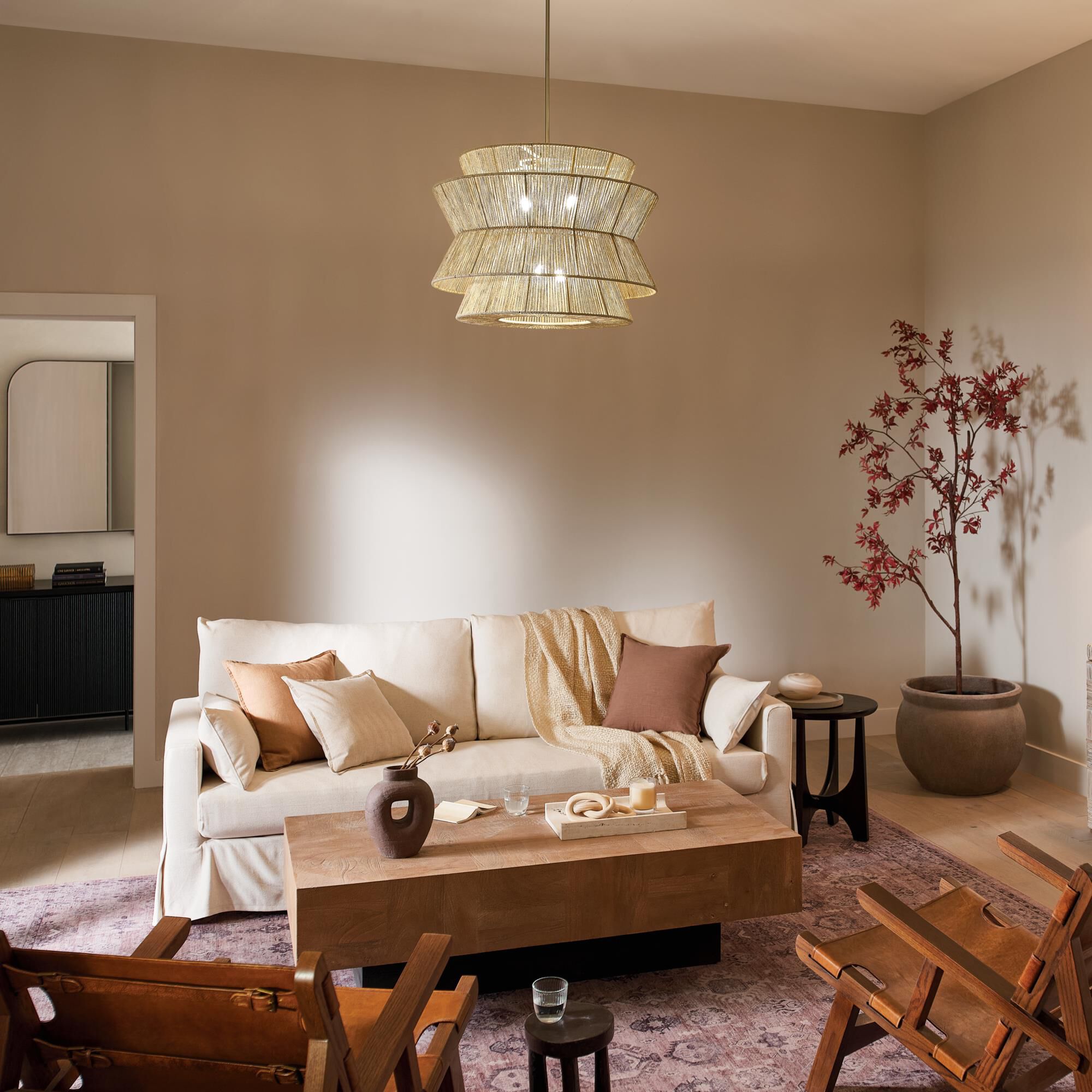 Shown in Champagne Bronze finish and Natural Fibers Textured shade