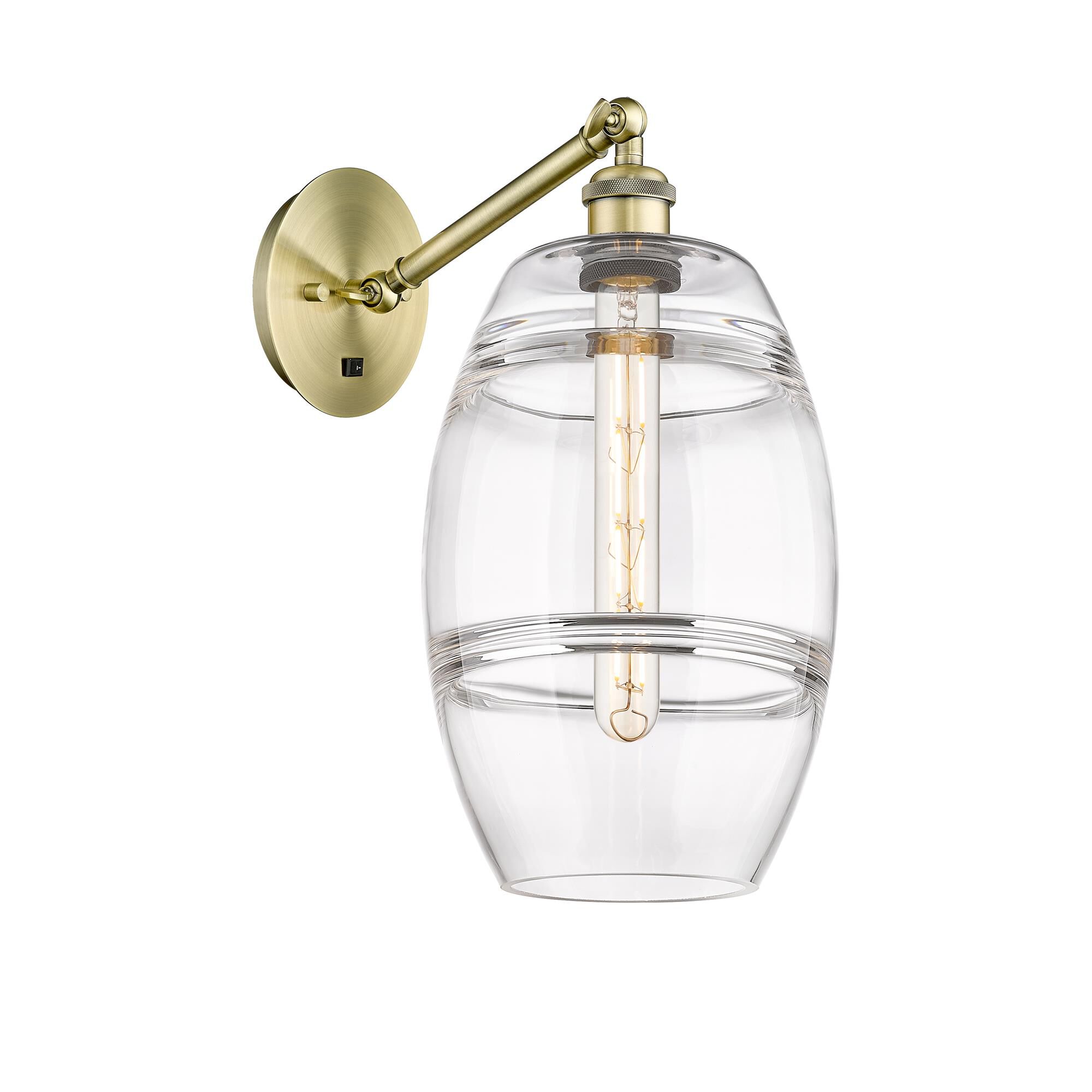 Shown in Antique Brass finish and Clear glass