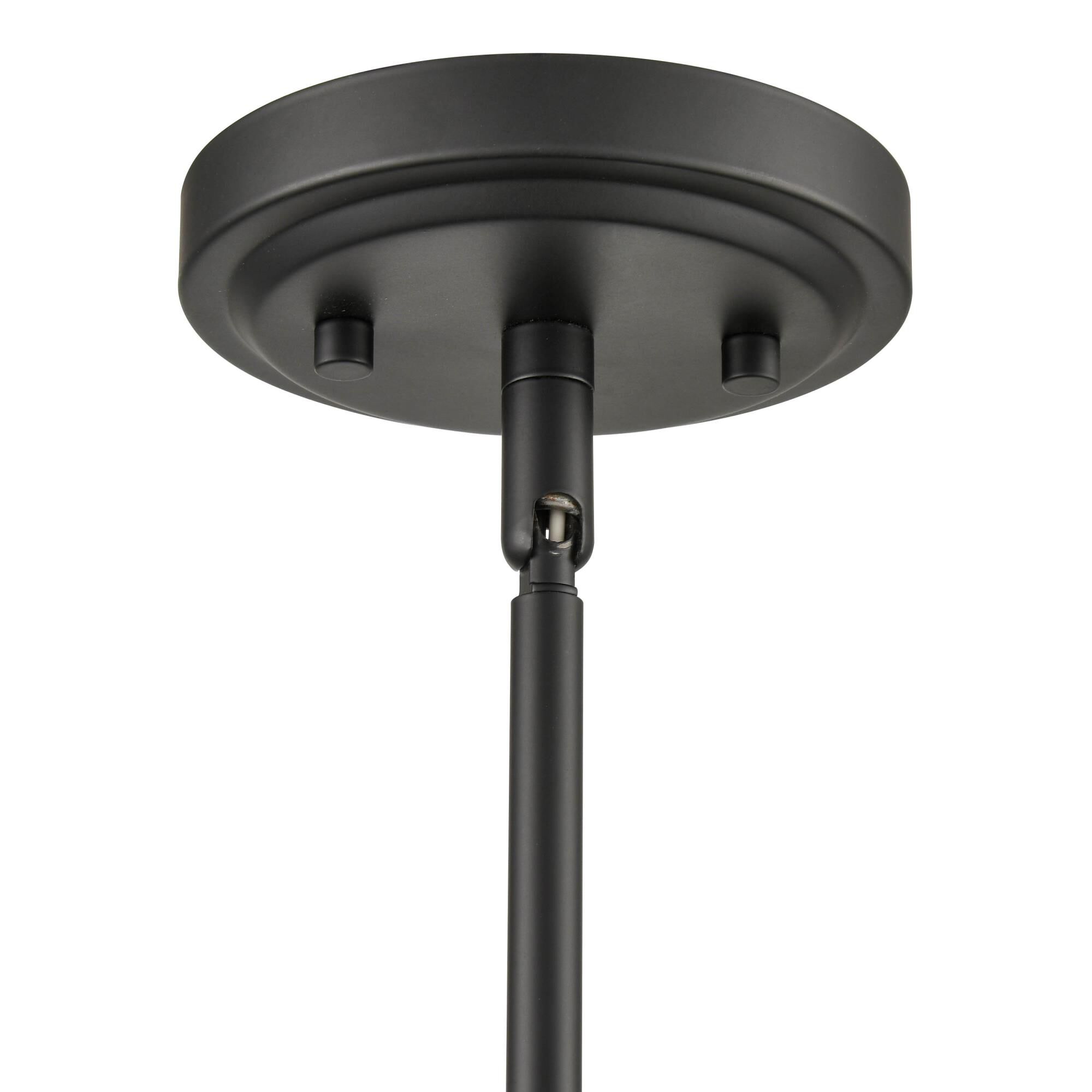 Shown in Matte Black finish and Clear Seeded glass