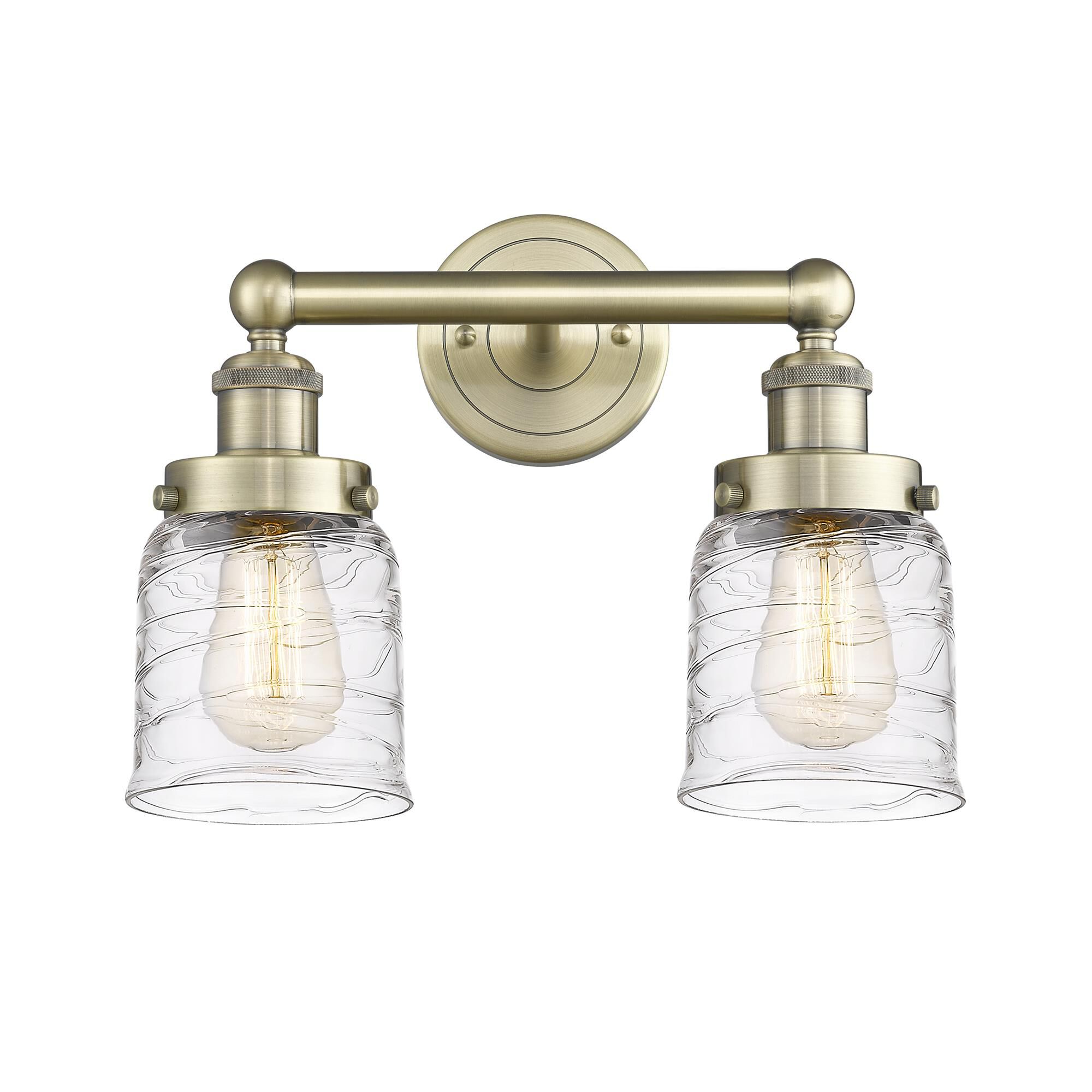 Shown in Antique Brass finish and Clear Deco Swirl glass