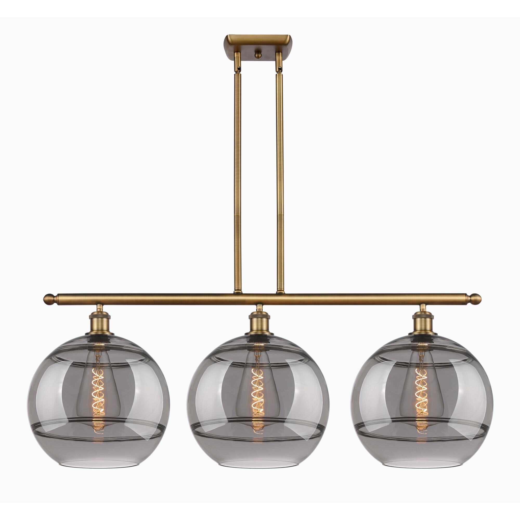 Shown in Brushed Brass finish and Light Smoke glass