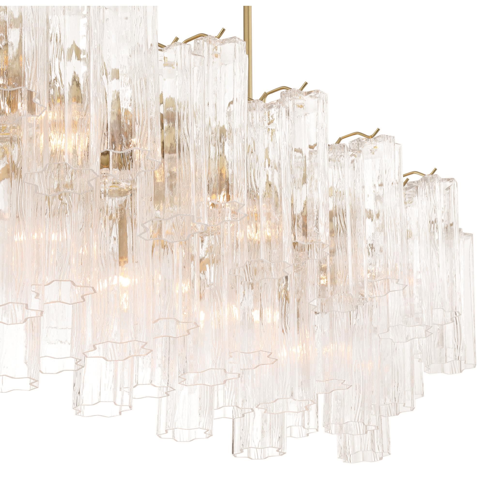 Shown in Brushed Brass finish and Clear Tronchi glass