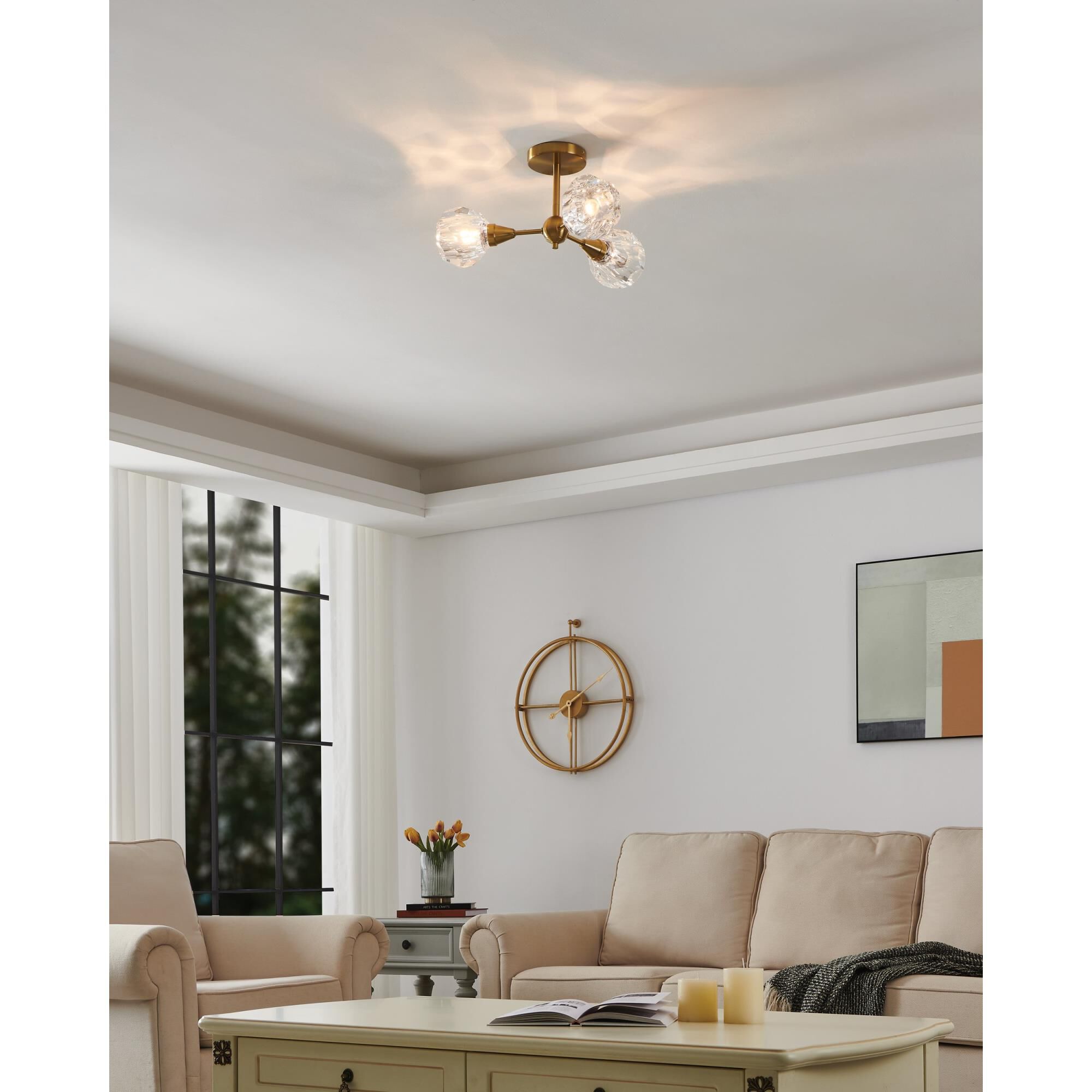 Shown in Brushed Gold finish and Clear glass