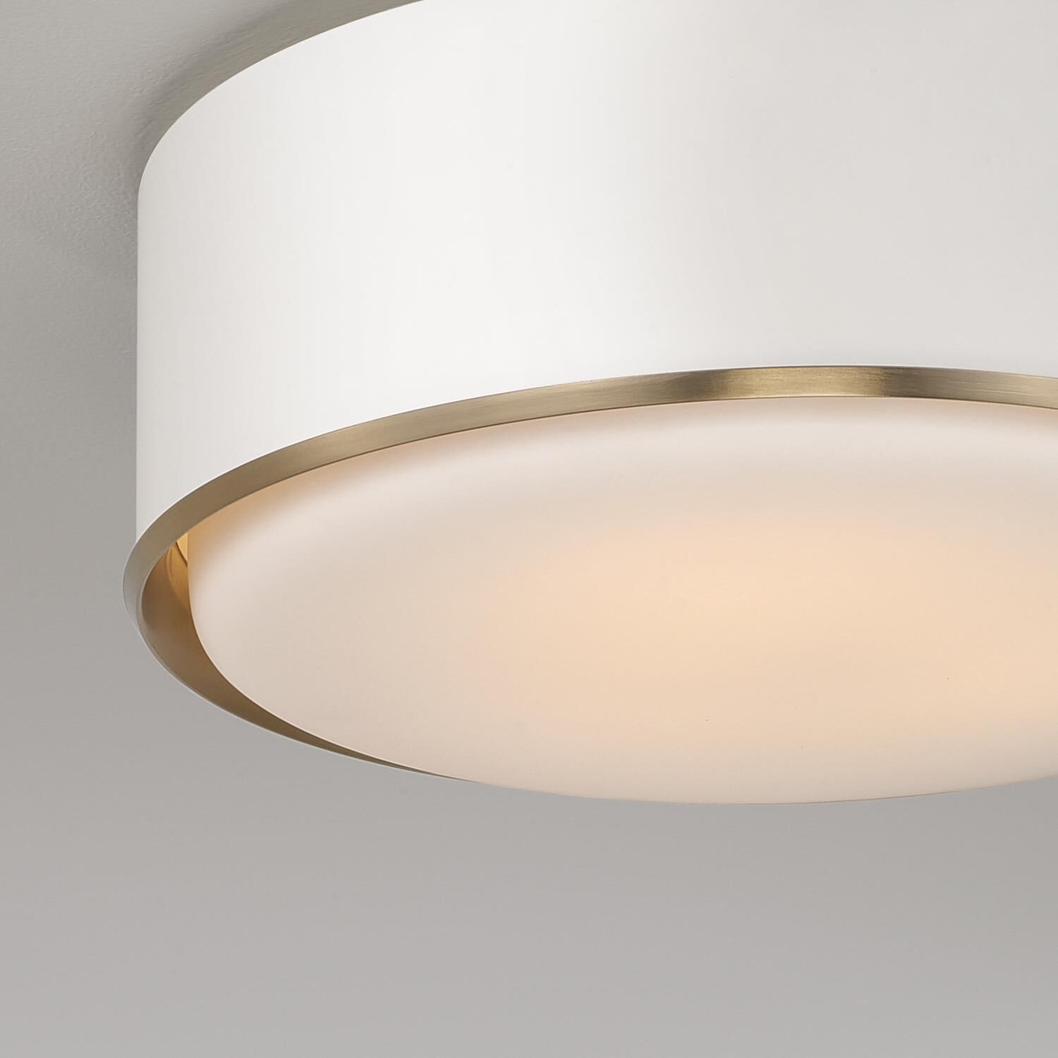 Shown in Matte Brass And White finish and Soft White glass