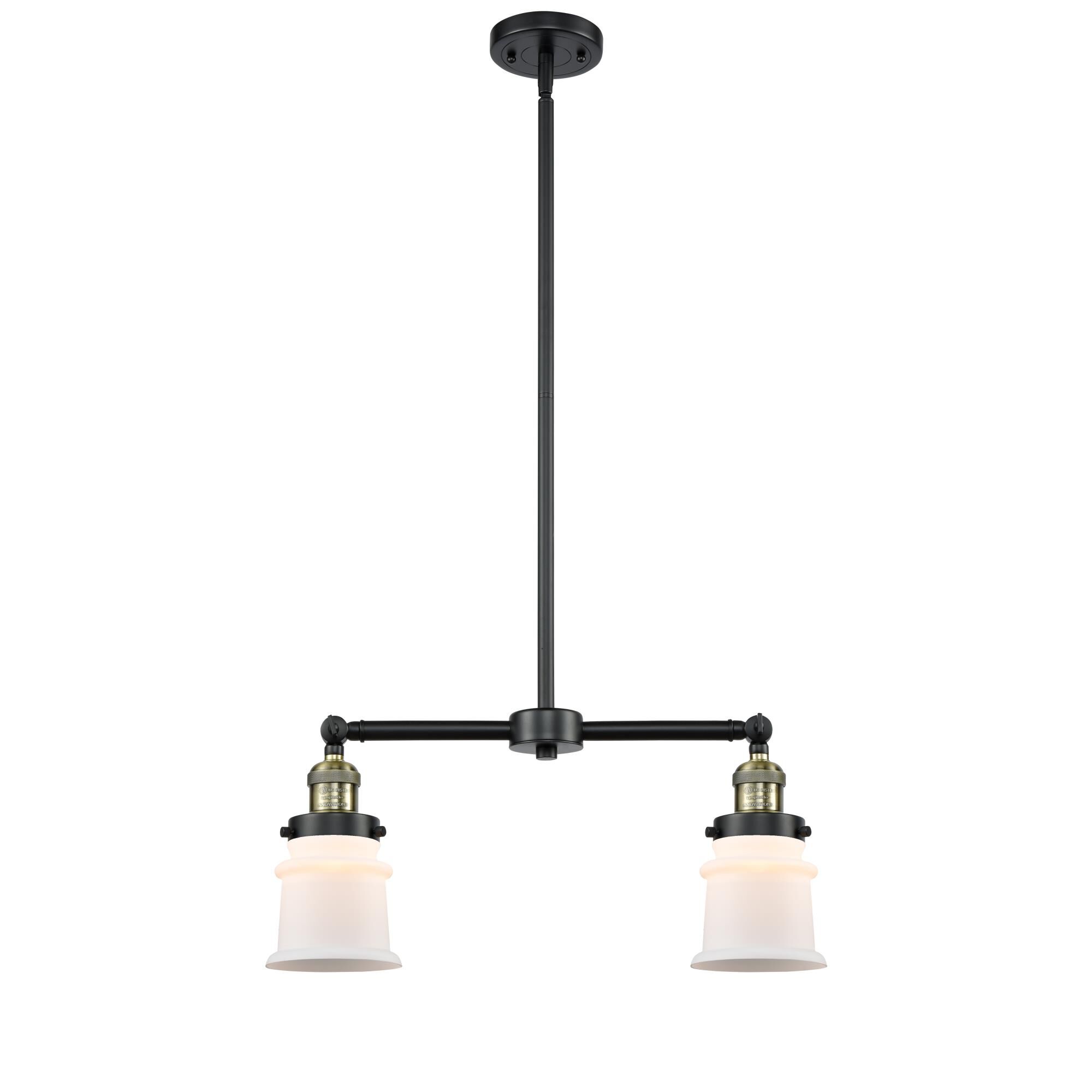 Shown in Black Antique Brass finish and Matte White Cased glass