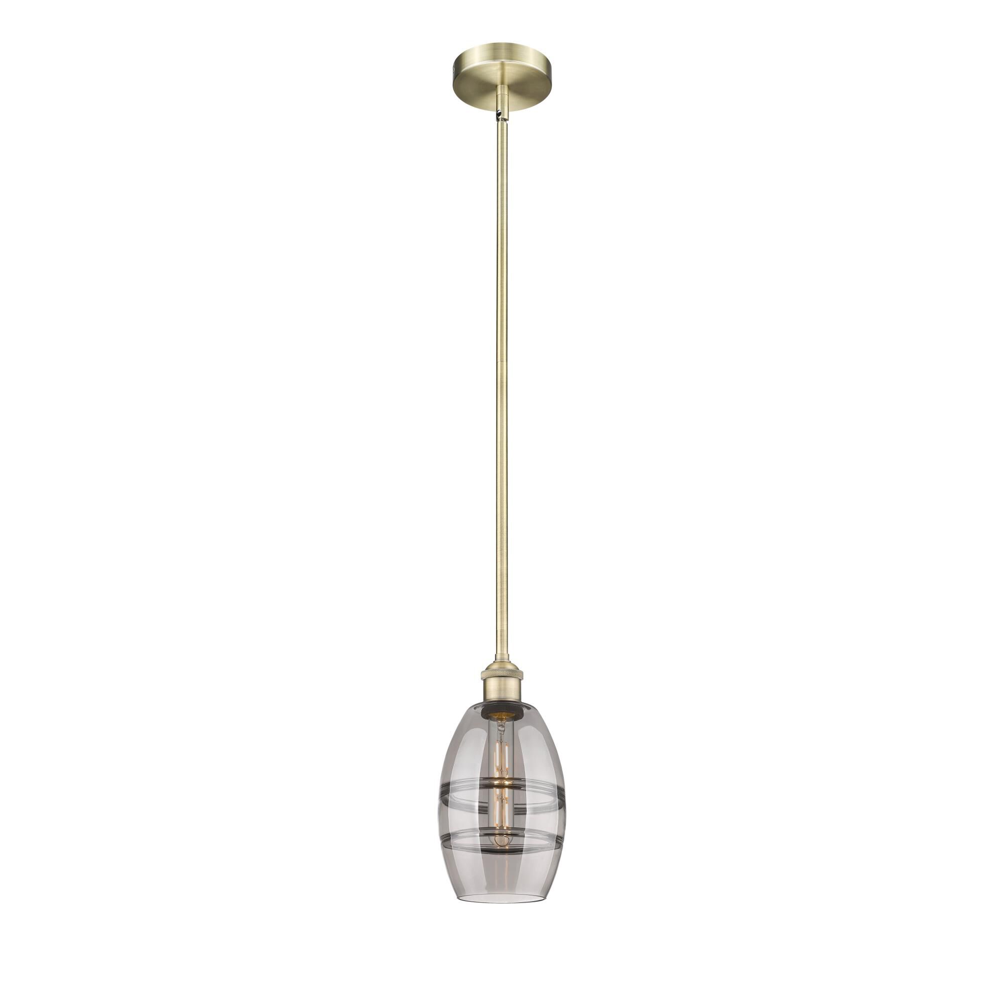 Shown in Antique Brass finish and Light Smoke glass