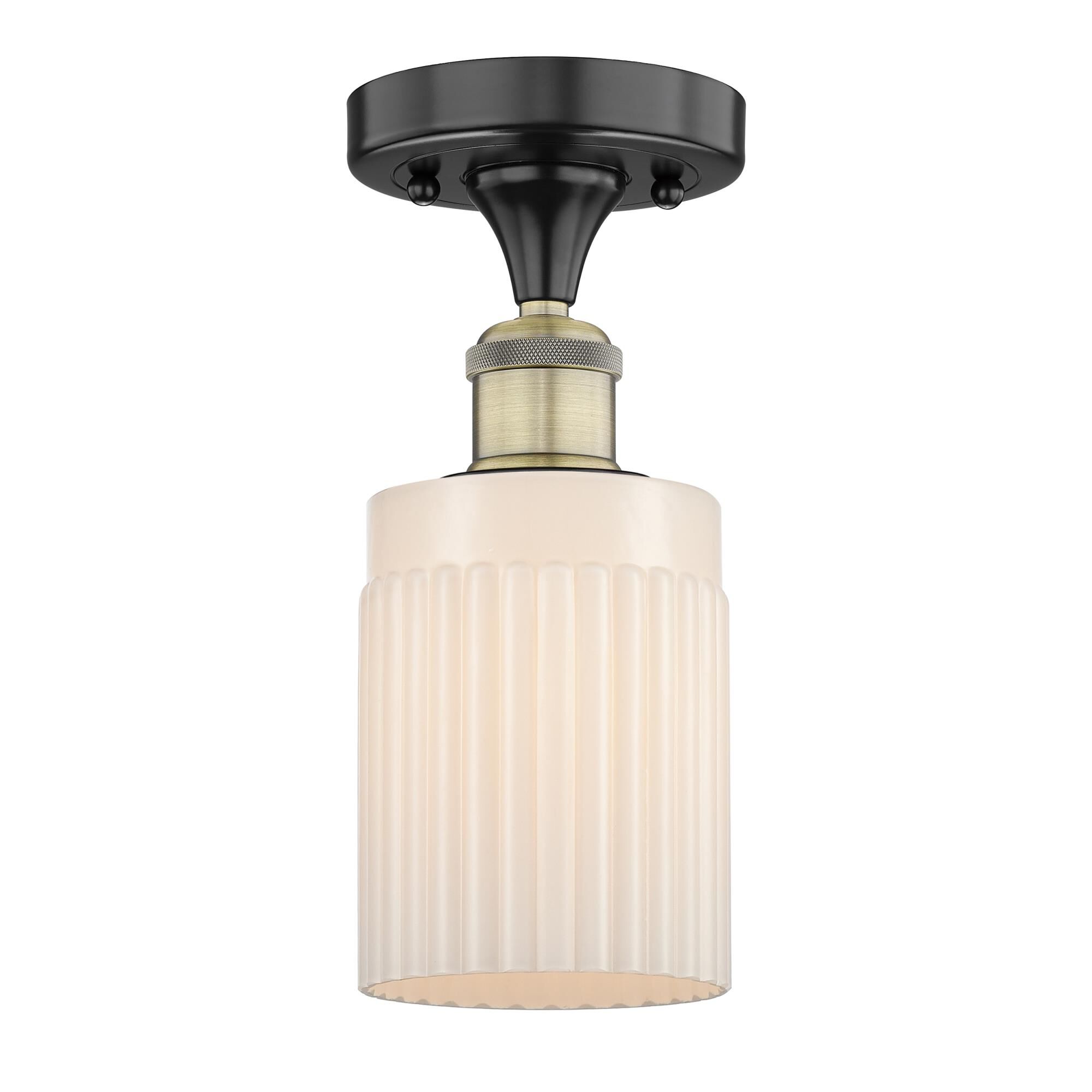 Shown in Black Antique Brass finish and Matte White glass