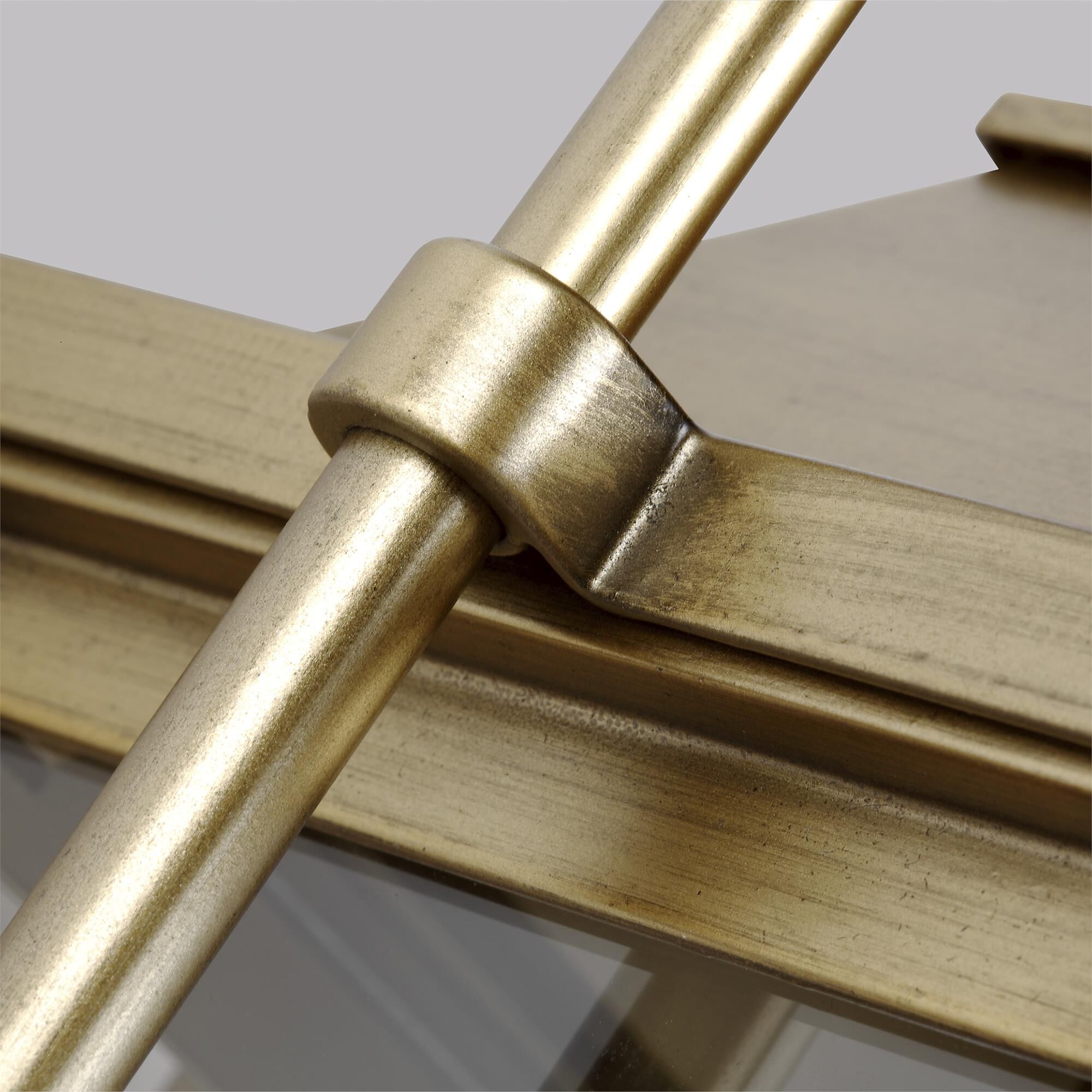 Shown in Painted Distressed Brass finish and Clear Panels glass