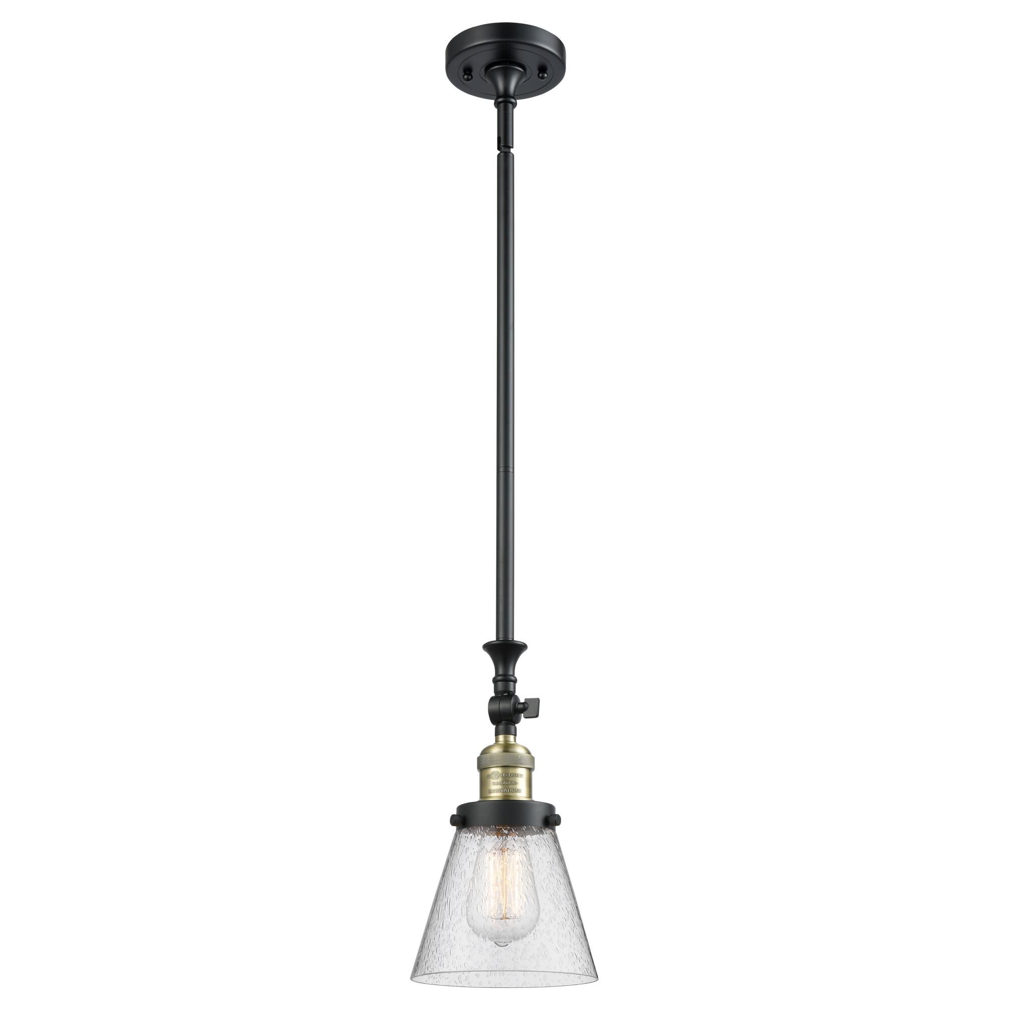Shown in Black Antique Brass finish and Seedy glass