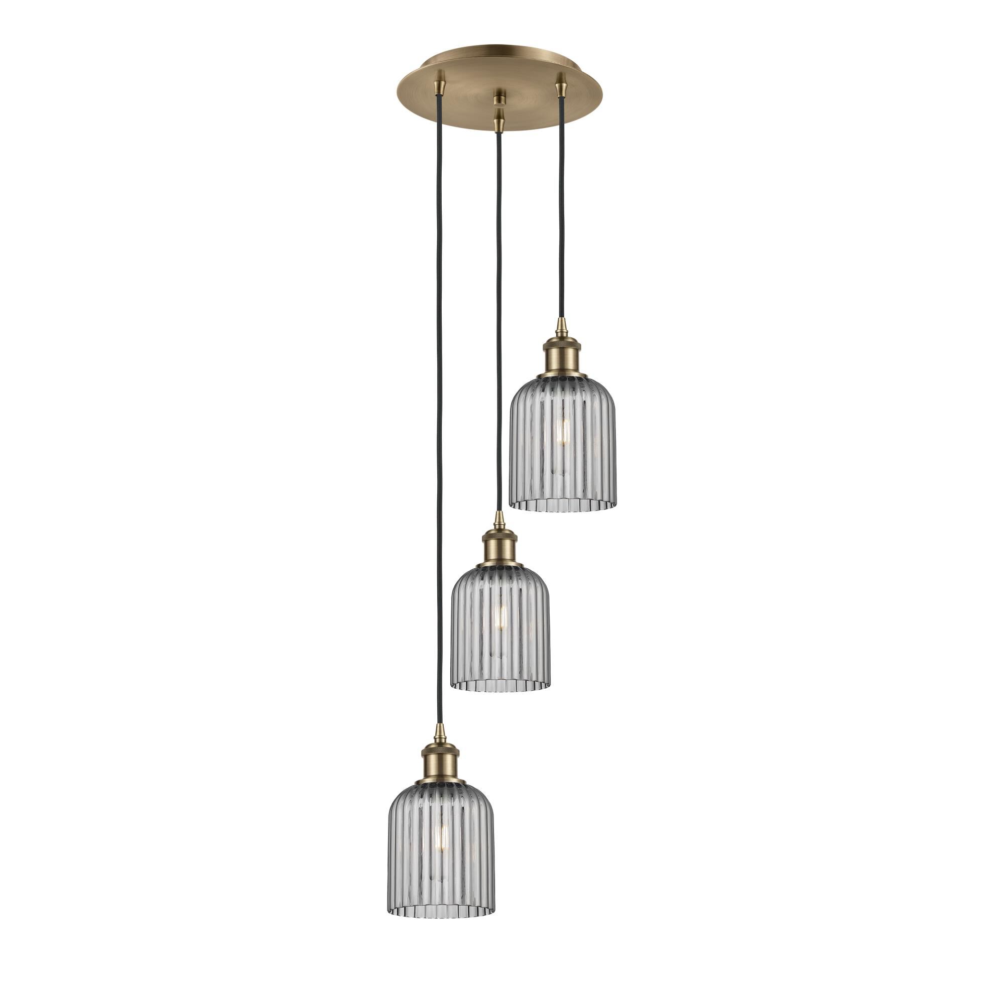 Shown in Antique Brass finish and Light Smoke shade