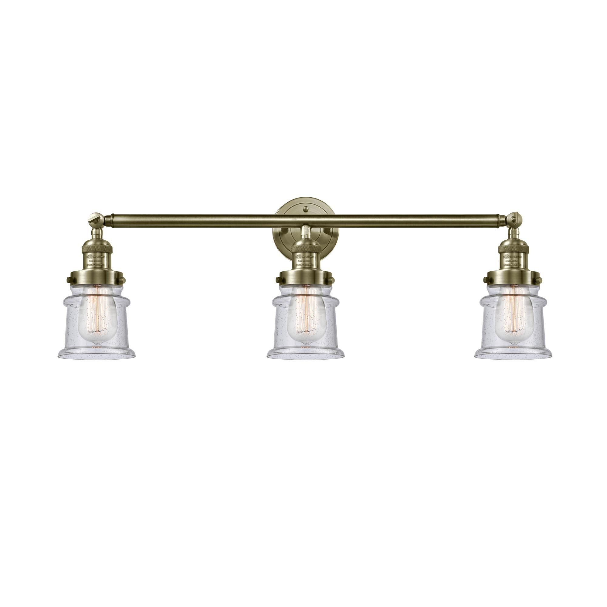 Shown in Antique Brass finish and Seedy Canton glass