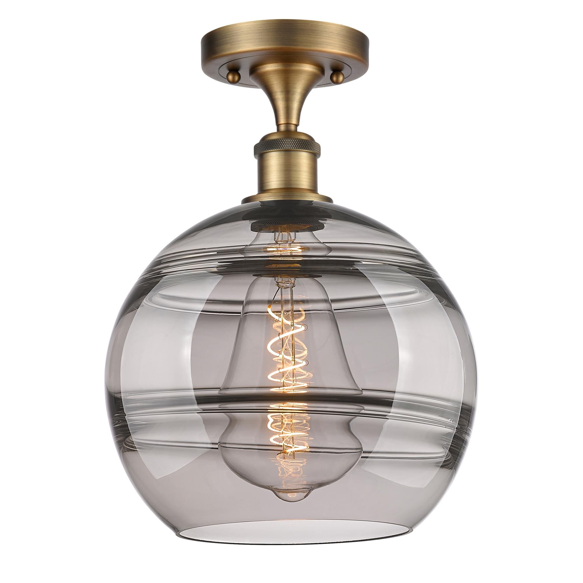 Shown in Brushed Brass finish and Light Smoke glass