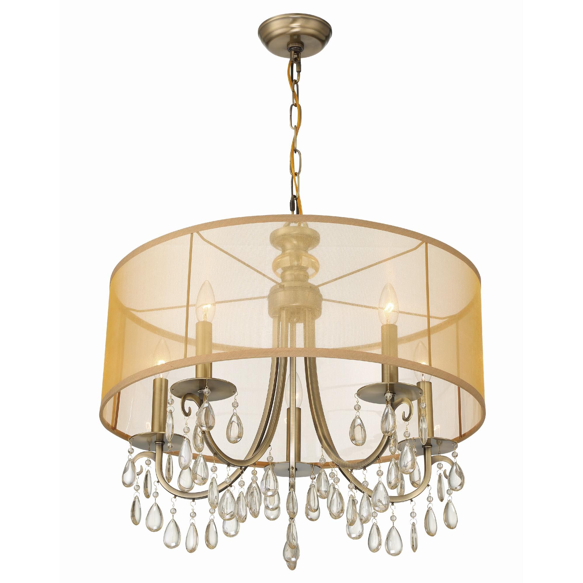 Shown in Antique Brass finish and Etruscan Teardrop Almond crystal and Silk glass and Translucent Gold shade