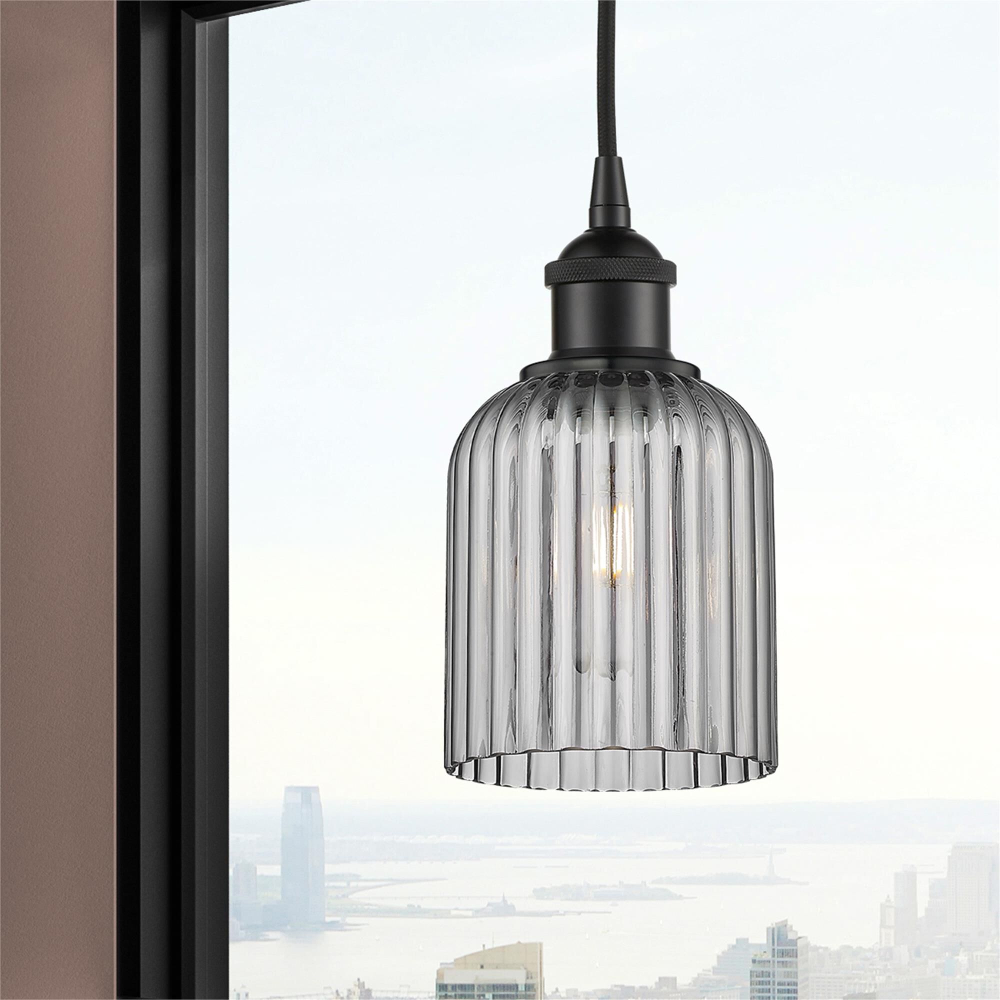 Shown in Matte Black finish and Light Smoke glass