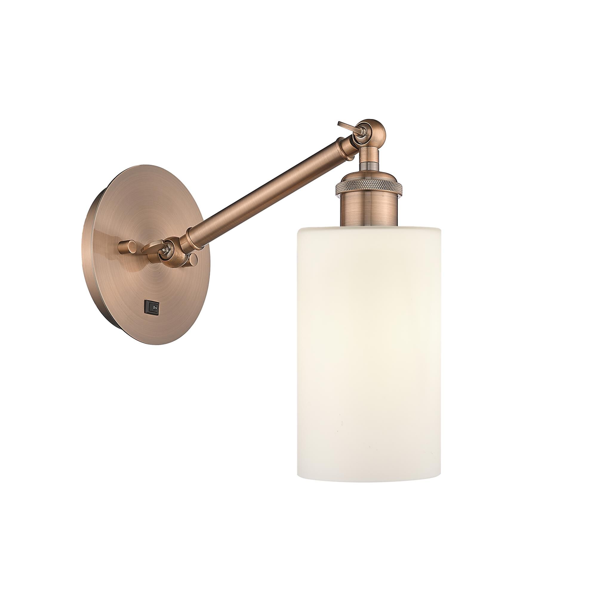 Shown in Antique Copper finish and Matte White Clymer glass