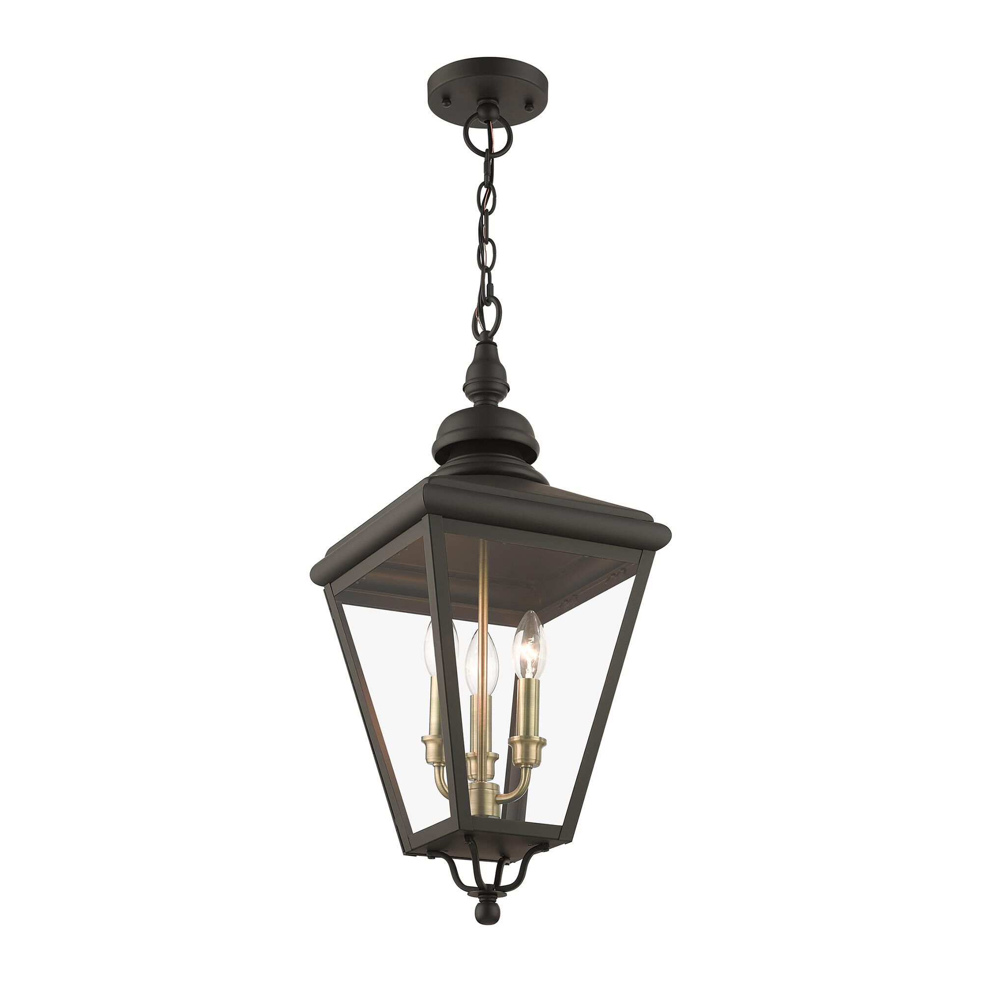 Shown in Bronze With Antique Brass Cluster finish and Clear glass