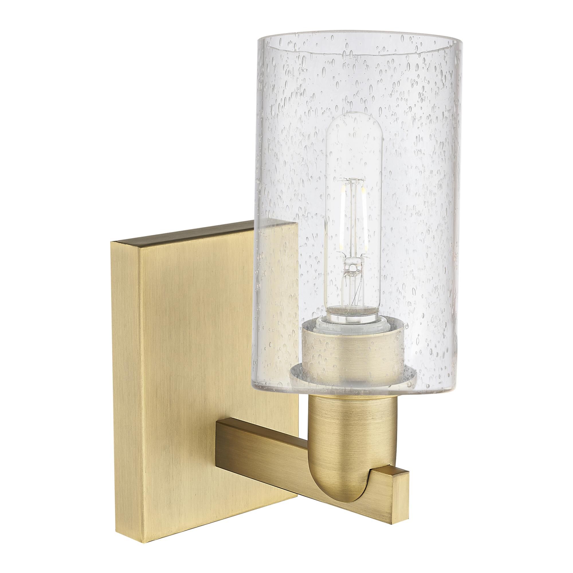 Shown in Brushed Brass finish and Seedy glass