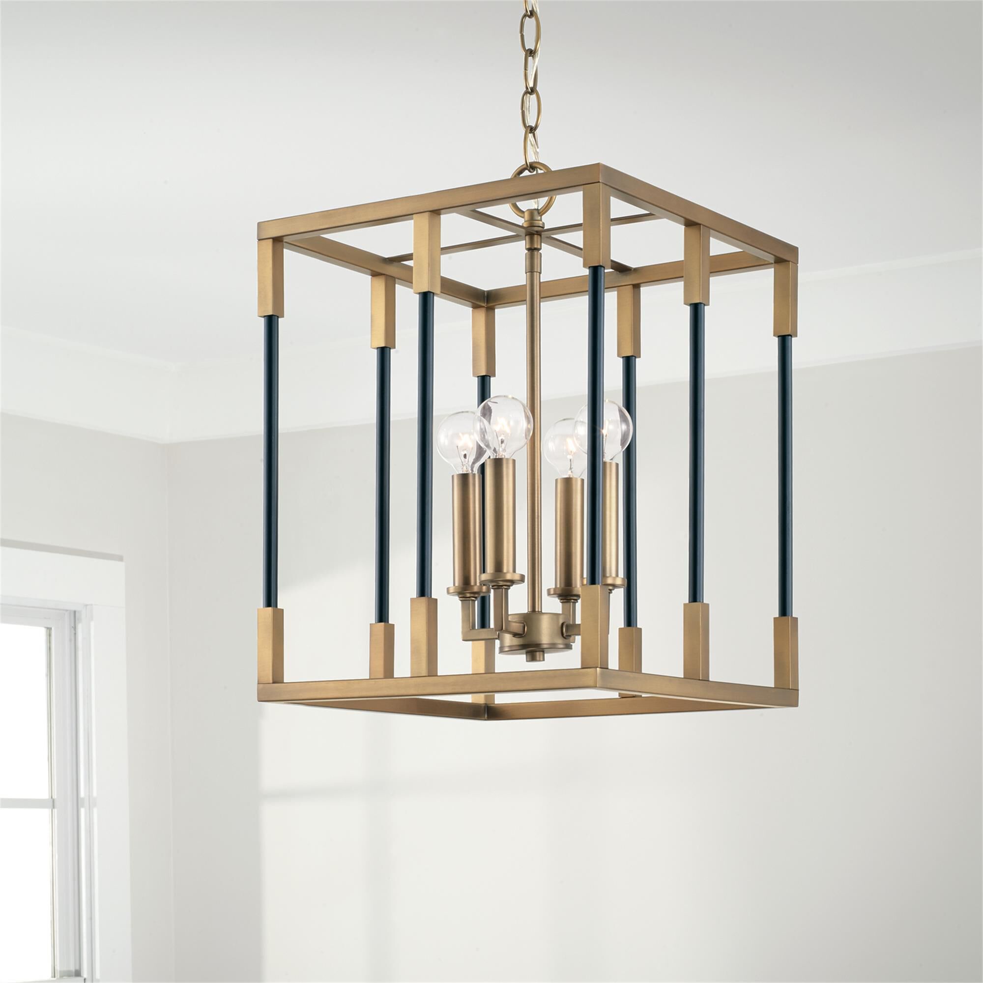 Shown in Aged Brass and Black finish