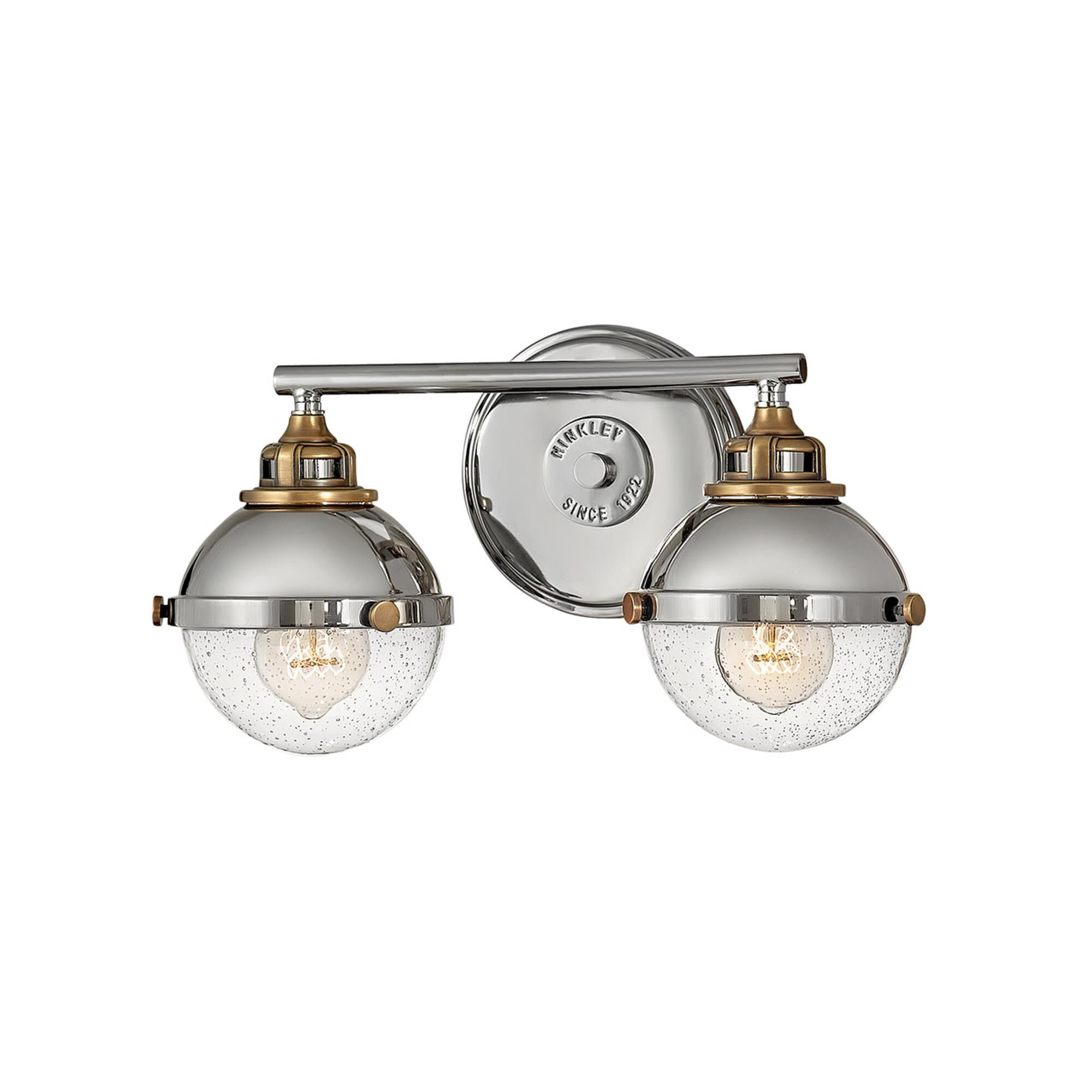 Shown in Polished Nickel finish and Clear Seedy glass and Heritage Brass accent