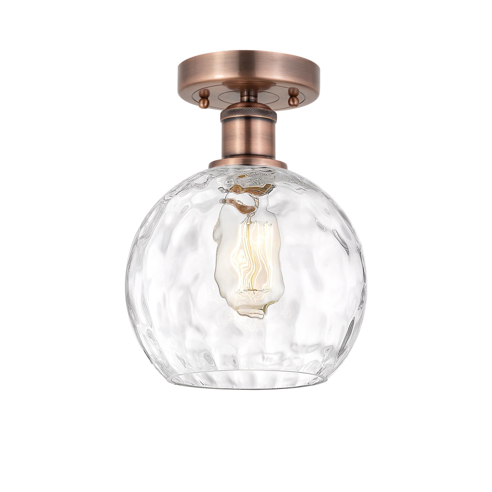 Shown in Antique Copper finish and Clear Water Glass glass