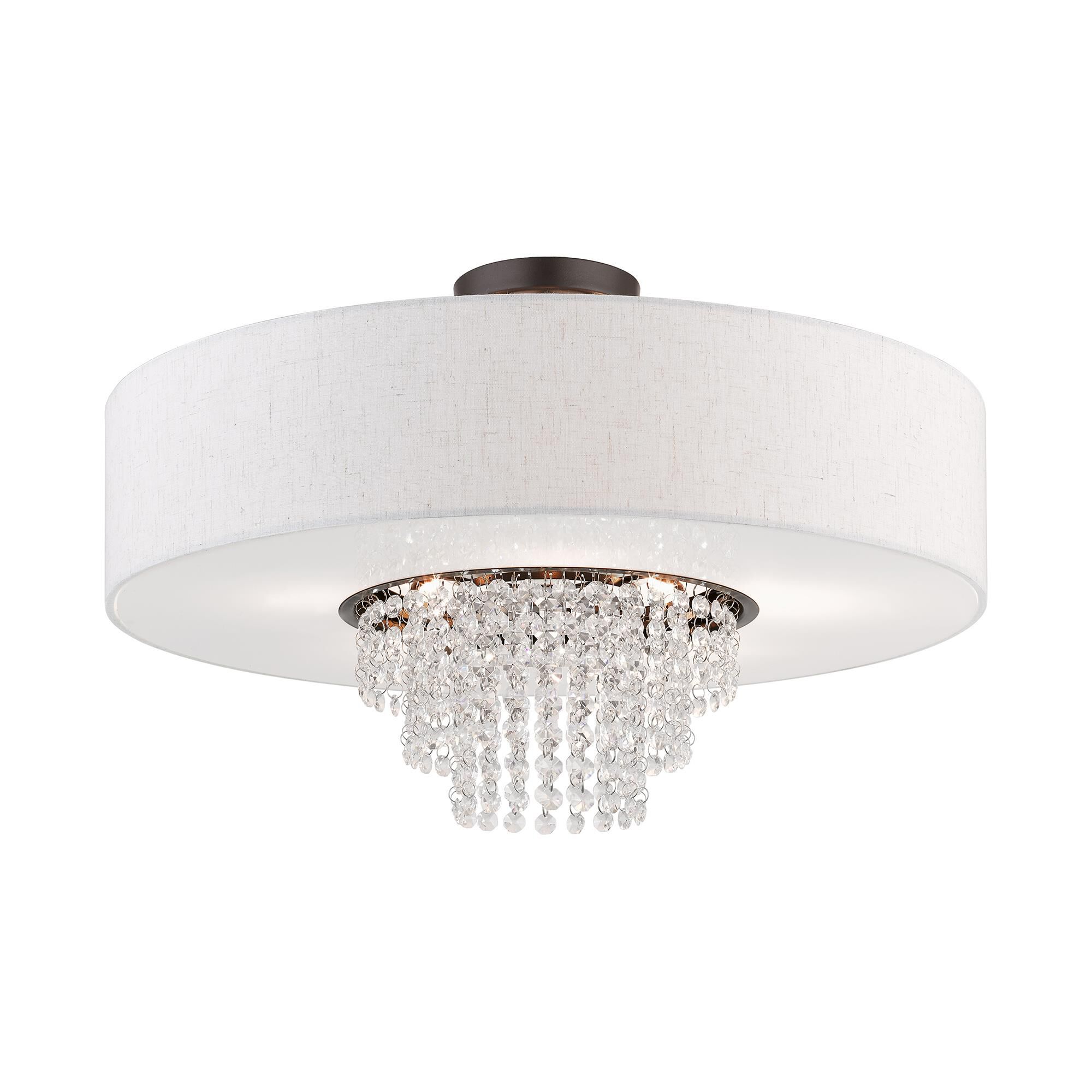 Shown in English Bronze finish and Hand Crafted Oatmeal Color Fabric Outside & White Fabric Inside Hardback  with Clear Crystals shade