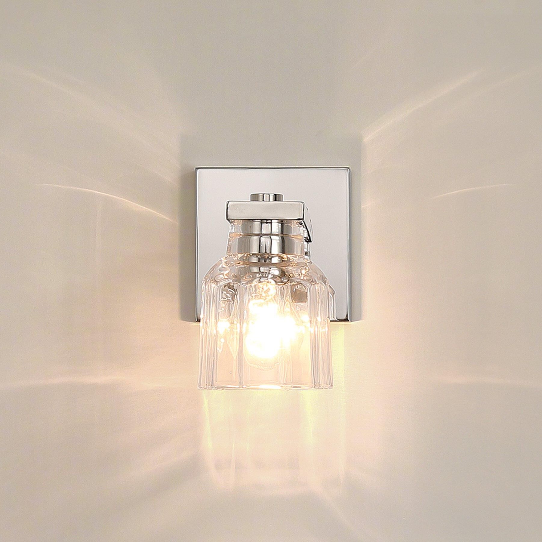 Shown in Polished Nickel finish and Clear Ribbed glass