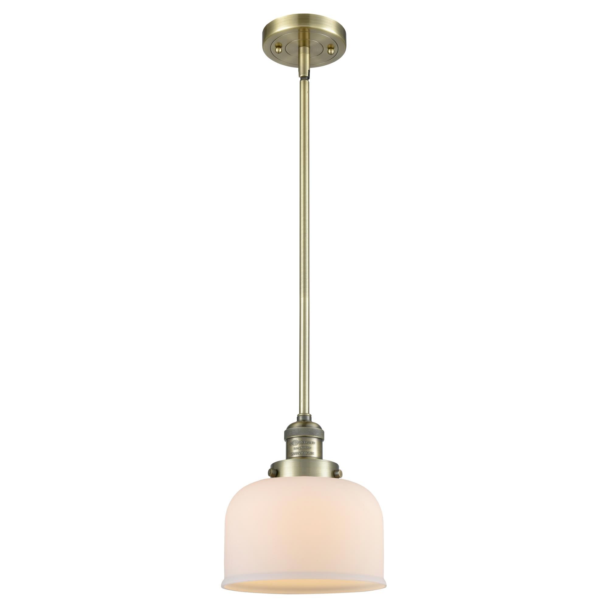 Shown in Antique Brass finish and Matte White Cased glass