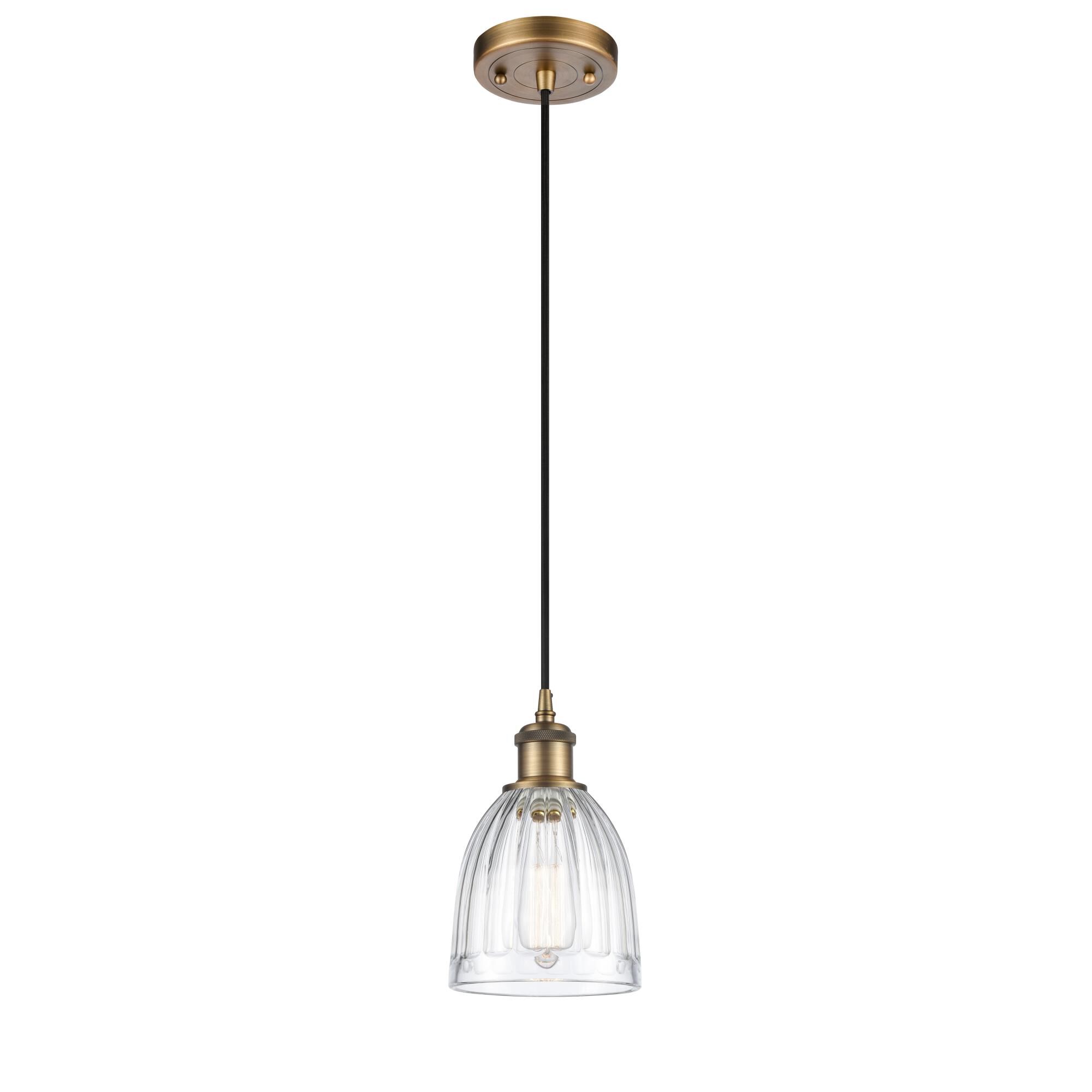 Shown in Brushed Brass finish and Clear Brookfield glass