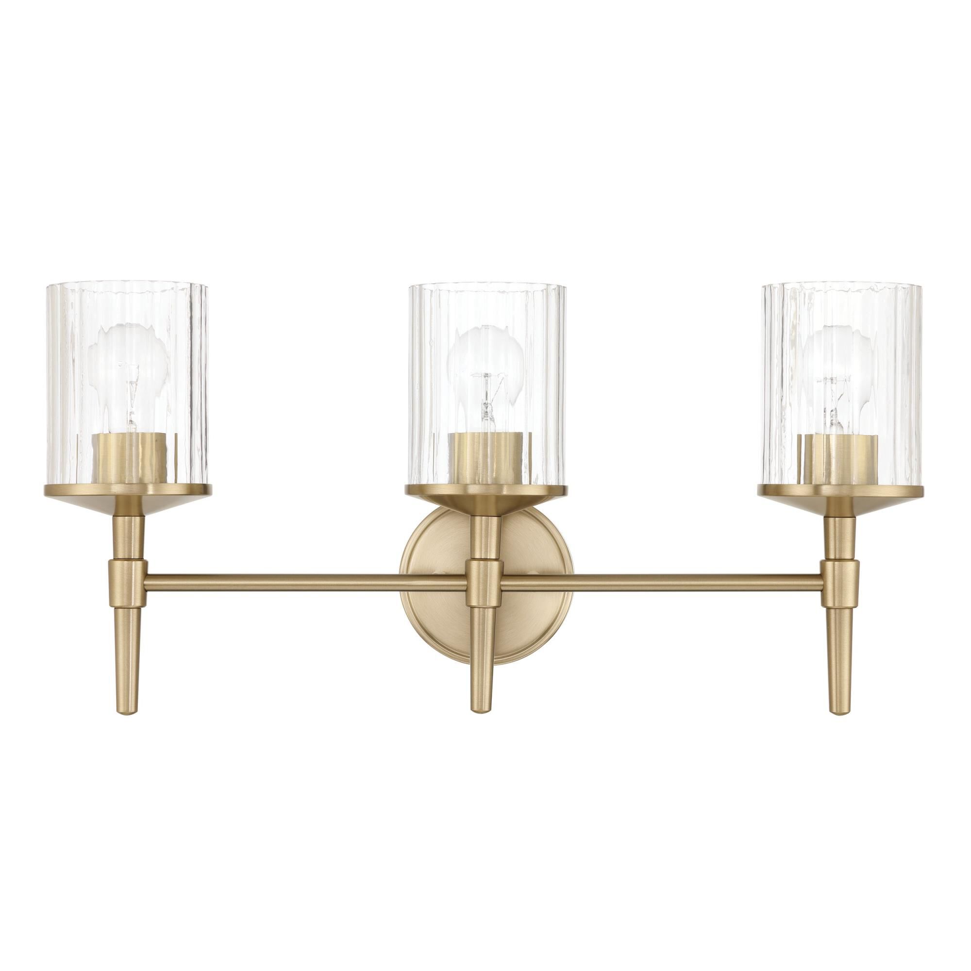 Shown in Champagne Gold finish and Clear Ribbed glass