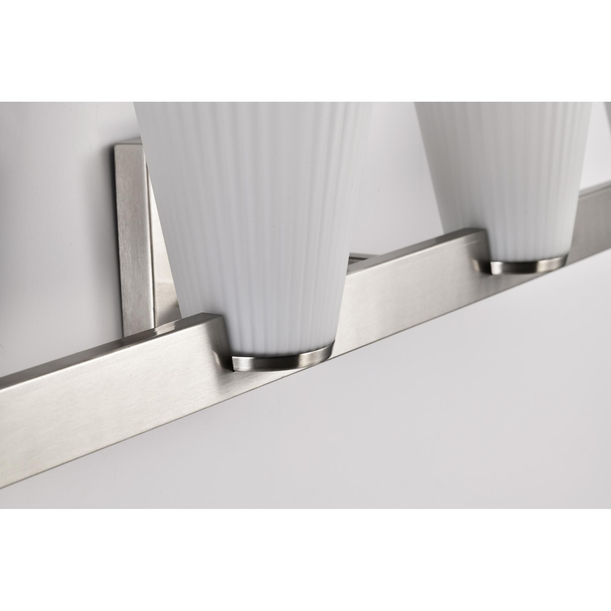 Shown in Brushed Nickel finish and Ribbed White glass