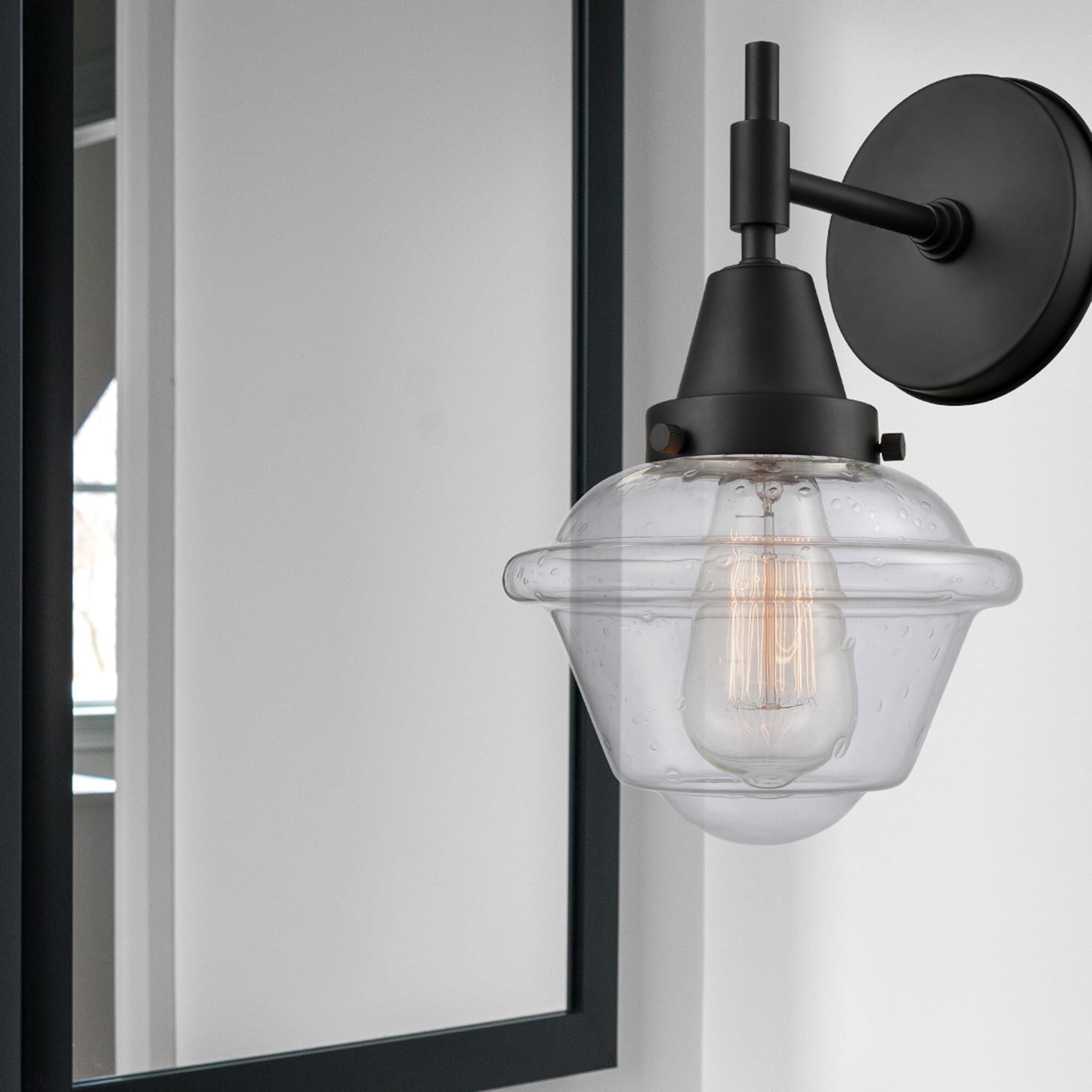 Shown in Matte Black finish and Seedy Large Cone glass