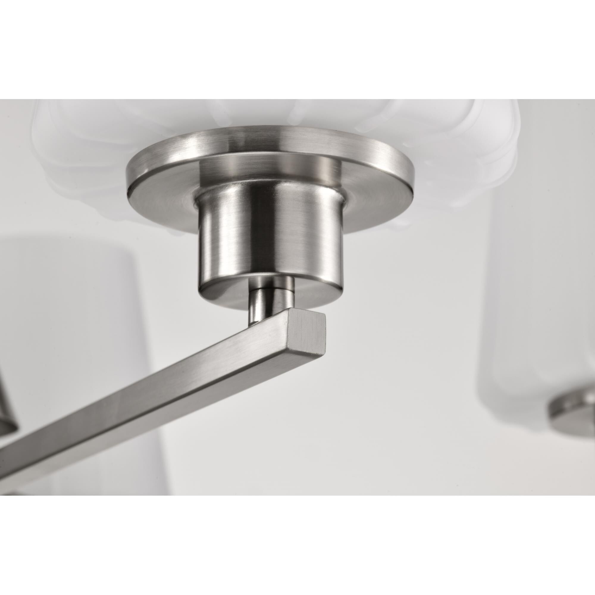 Shown in Brushed Nickel finish and Etched White glass