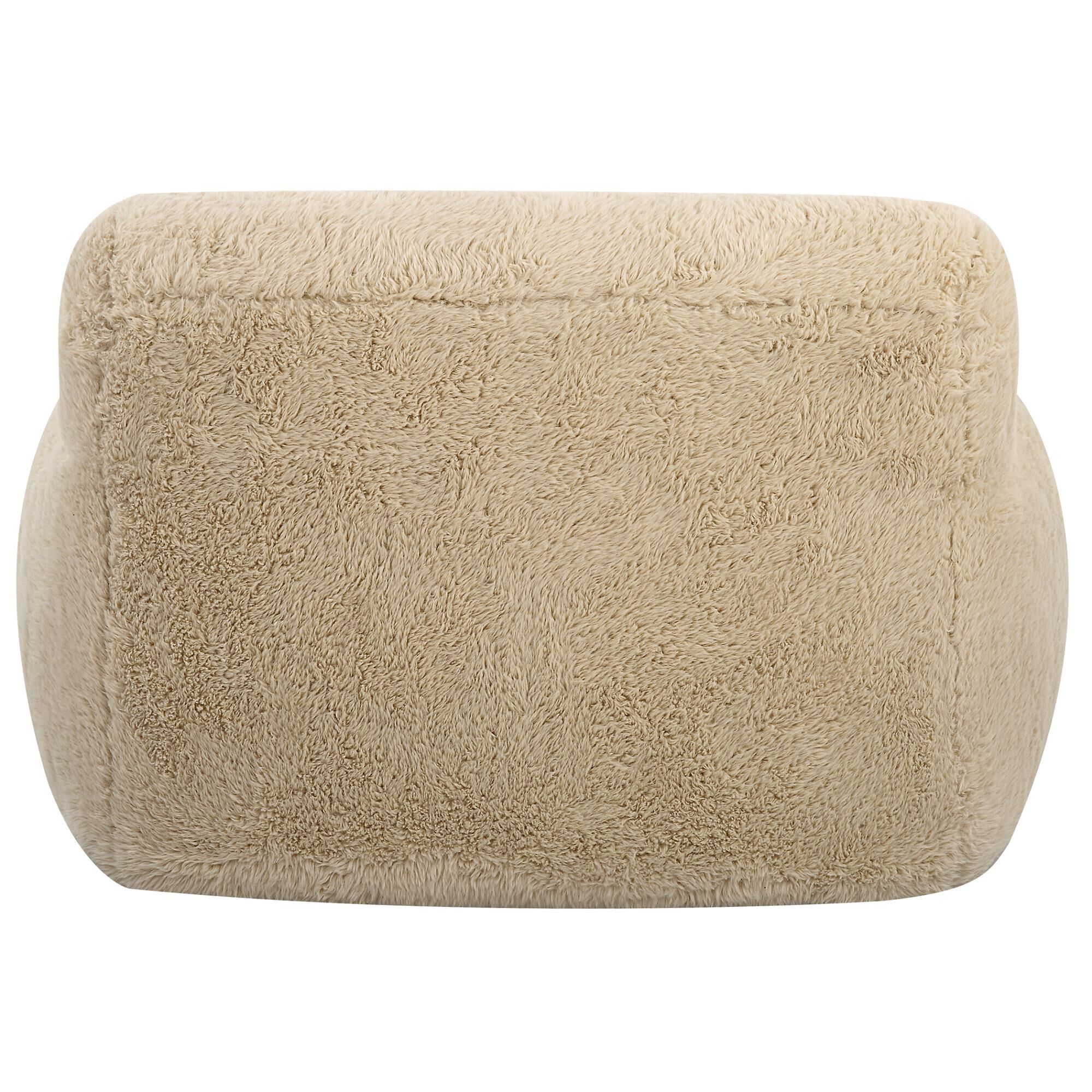 Shown in The Definition Of A Cozy Place To Rest, The Caramel Toned Long-Haired Faux Sheepskin Creates Rich Te finish