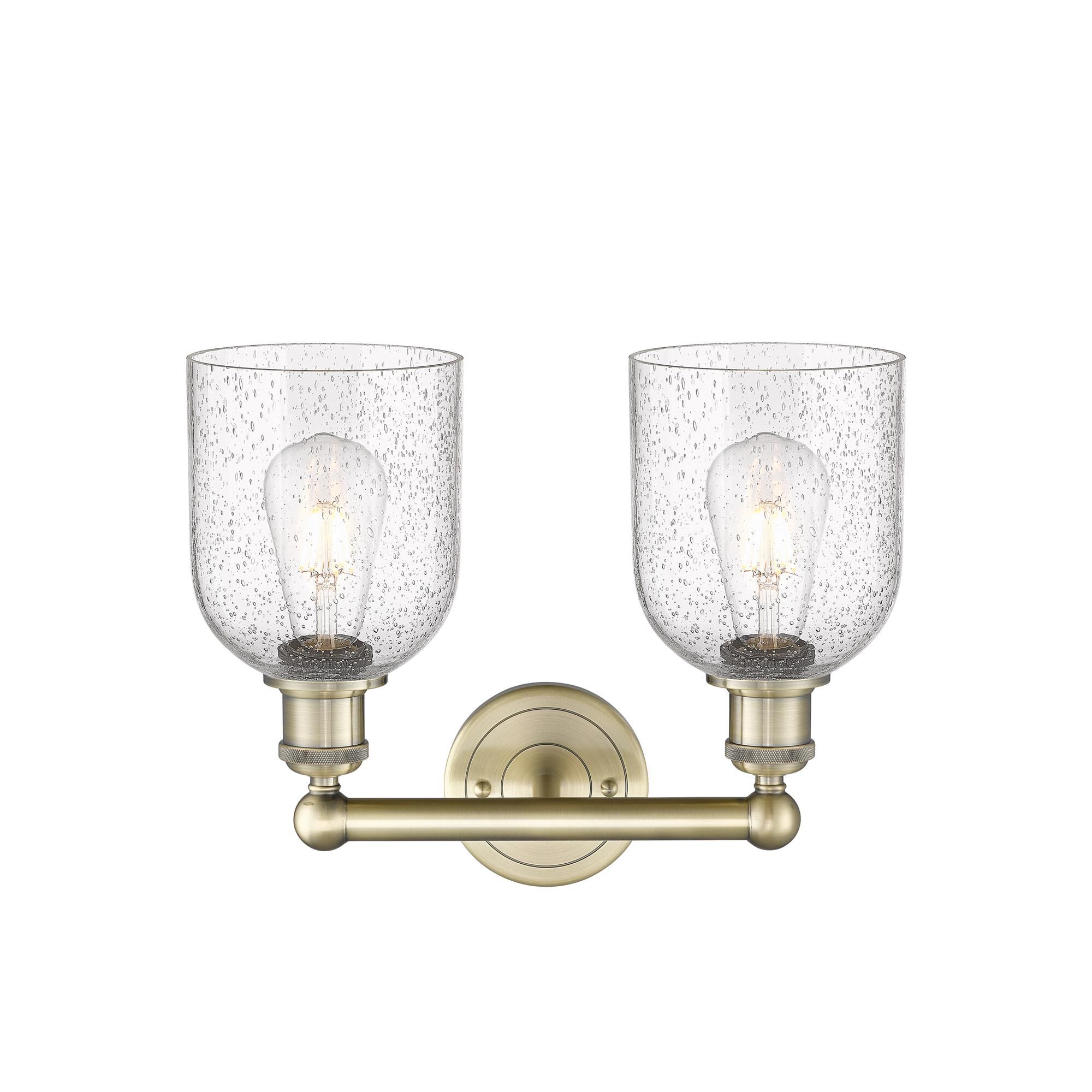 Shown in Antique Brass finish and Seedy glass