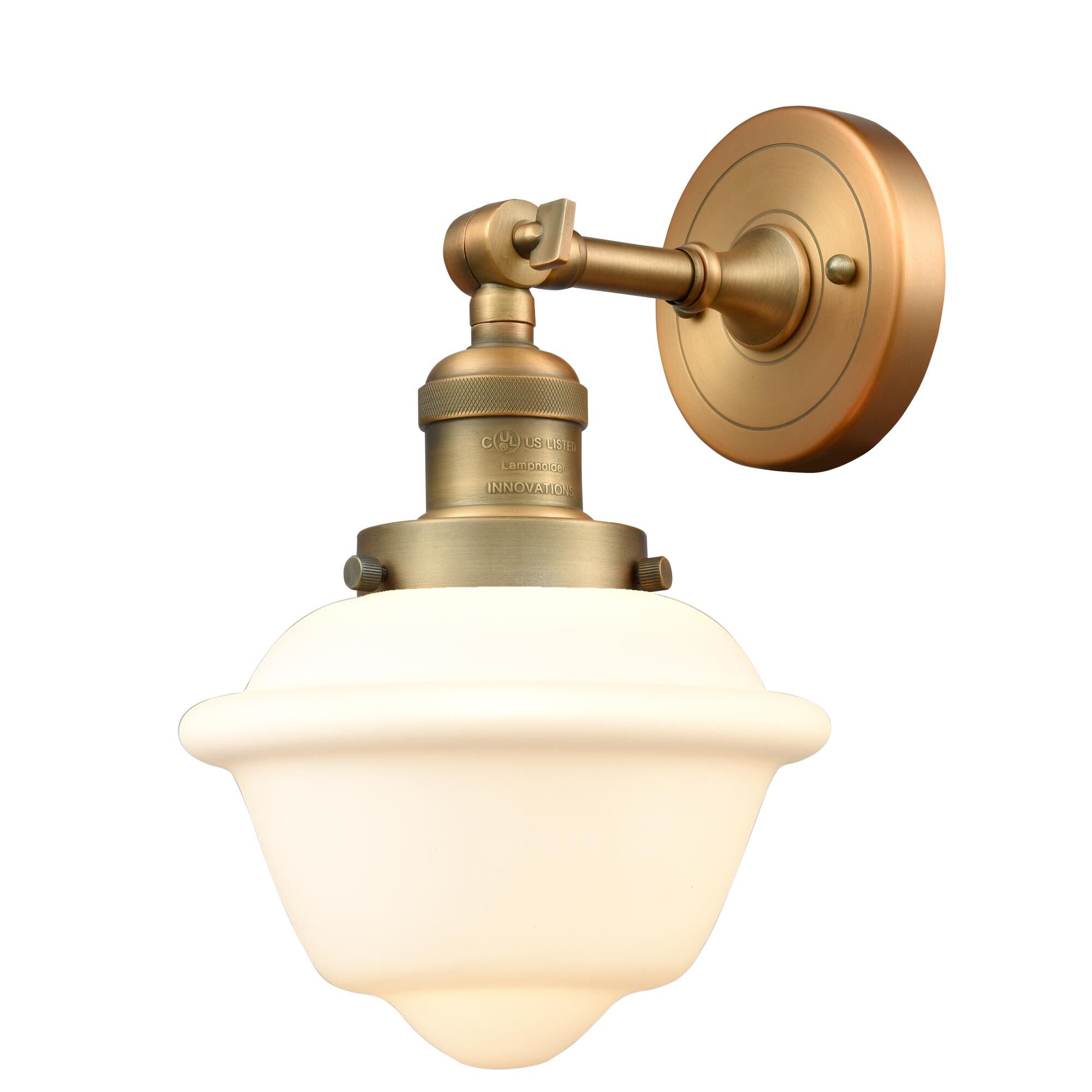 Shown in Brushed Brass finish and Matte White glass