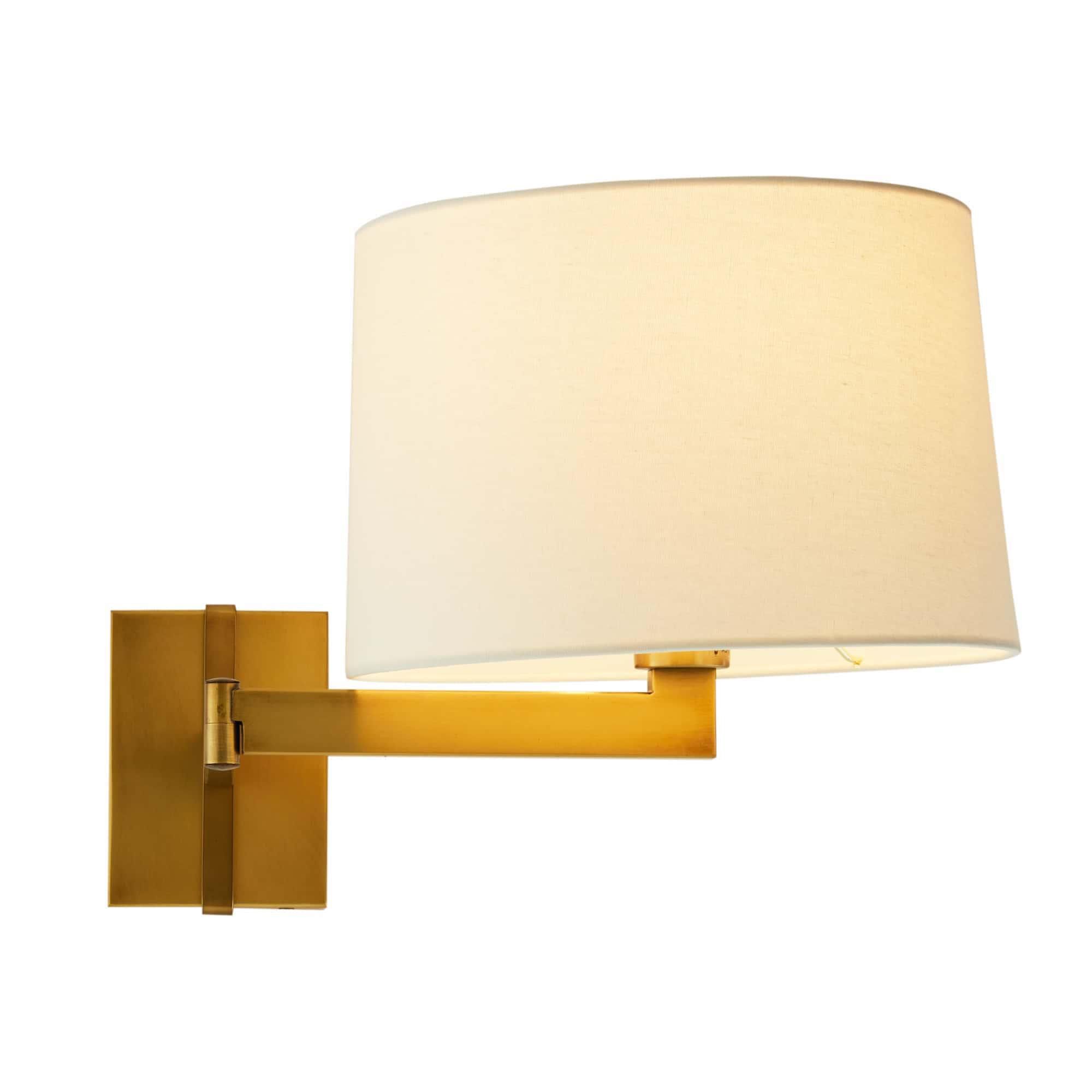 Shown in Antique Brass finish and Linen shade